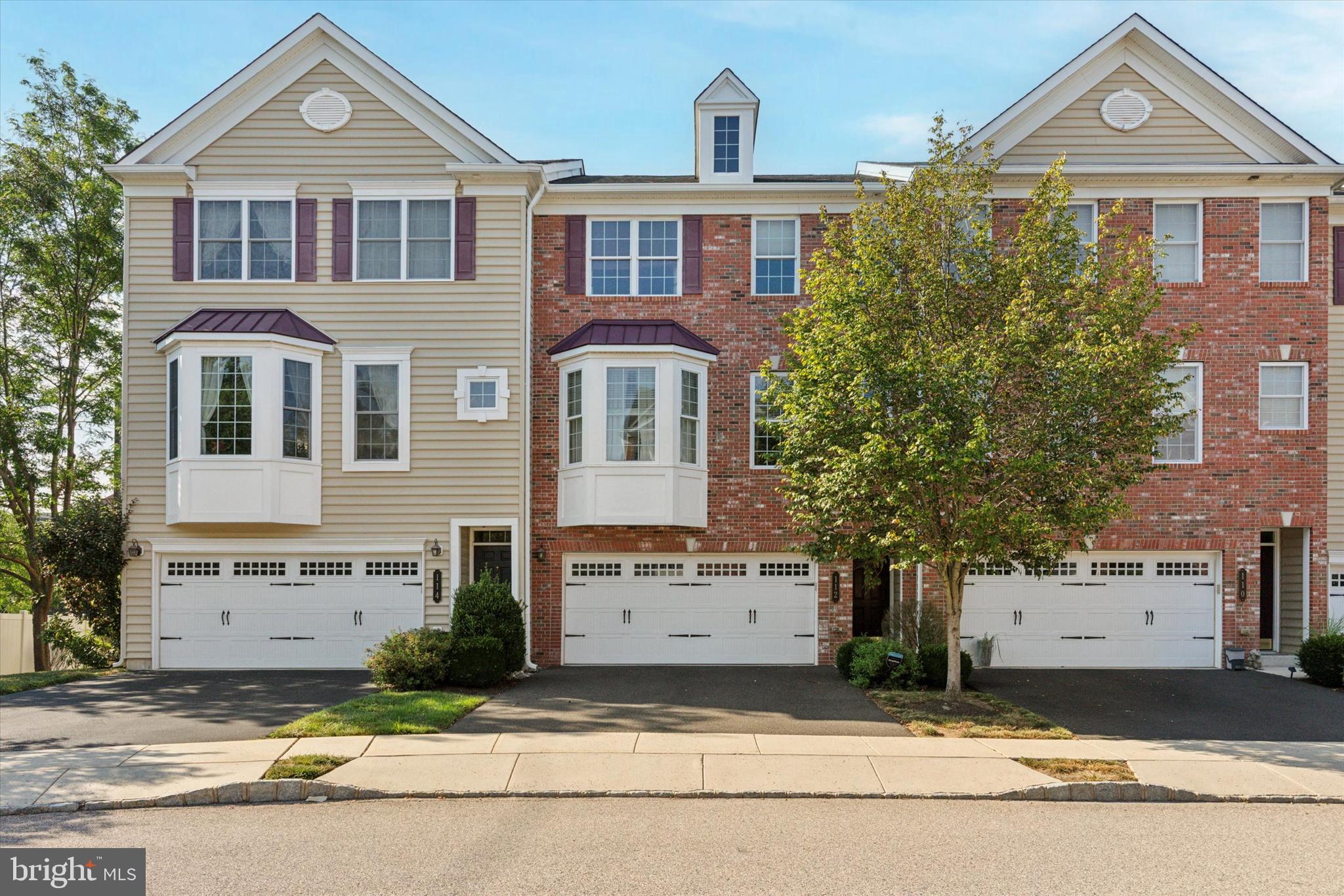 Come on in—your next chapter starts in this beautiful brick-front townhome in the heart of Ambler borough! Offering 3 bedrooms, 2 full and 2 half baths, a spacious 2-car garage, and stylish finishes throughout. Step inside to the ground-lower level family room, perfect for relaxing or entertaining, with sliding glass doors that lead to the backyard. You’ll also find the first of two convenient half baths on this level. On the main level, warm hardwood floors and an open, light-filled layout set the tone. The kitchen features stainless steel appliances, a natural gas range, granite countertops, a tile backsplash, and a center island—ideal for everyday living and hosting. A cozy eat-in area opens to the private back deck, and there's also a separate dining area, and additional living space to suit your needs. On the upper level, you'll find two generously sized bedrooms, a full hall bath, a conveniently located laundry room , equipped with a washer and dryer. The spacious primary suite with vaulted ceilings, a walk-in closet, and abundant natural light, the primary bedroom is a true retreat. The recently remodeled ensuite bathroom is a showstopper, complete with sleek tile work, a dual vanity, and a glass-enclosed spa-style shower. Additional highlights include a finished lower level, ample storage, and natural gas heat. Located just minutes from downtown Ambler’s shops, dining, entertainment, and parks. Easy access to major highways, and the train station—this home offers the perfect mix of comfort, style, and convenience. Plus, Low HOA fees! Don’t miss the opportunity to make this beautiful townhome your own. Schedule your private showing today and experience all that this exceptional Ambler borough property has to offer.