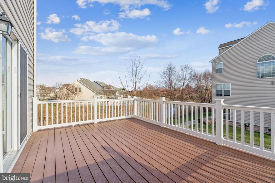 Welcome to this like-new townhome in the highly sought after community of Ellendale-perfectly located with easy access to everything and a direct route to Annapolis. This spacious end-unit is ideally positioned on a private corner lot, offering peaceful pond views and added privacy.  

Inside, you'll find a fresh modern feel with brand new flooring throughout and freshly painted interiors, making this home completely move-in ready. The open and airy layout provides plenty of space for both everyday living and entertaining. 

Upstairs, the primary suite offers a serene retreat, complete with seasonal water views  during the winter months- added a touch of coastal charm. 

As an added bonus, the 30-year front foot assessment has been paid in full, providing significant long-term value and peace of mind.  That's a $50/month savings for the next 17 years!!! ($10,200)

This is low-maintenance living at its best in one of the area's most desirable neighborhoods. Welcome home!