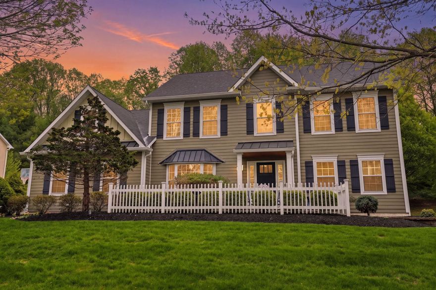 This is the one you’ve been waiting for. Meticulously maintained and thoughtfully updated, this stunning home in the Ridings of Buckingham offers 4 bedrooms, 2.5 bathrooms, a finished basement, and a 2-car garage, all within the highly sought-after Central Bucks School District.  From the moment you arrive, the curb appeal is undeniable, with manicured landscaping, a bluestone walkway, and a covered front porch accented by fluted columns and an updated front door. The exterior is finished with durable Hardie Plank siding and a newer roof installed in 2023, offering both style and peace of mind. Step inside to a bright and welcoming foyer. To the left, a private home office features a bay window and recessed lighting, while to the right, a formal living and dining room combination showcases elegant crown molding. The heart of the home is the beautifully updated kitchen, complete with quartz countertops, stainless steel appliances, a stylish backsplash, a large sink with a touchless faucet, and an island with pull-out drawers for added storage and electric. Recessed lighting and an adjoining eat-in area create a warm and functional space for everyday living. Hardwood flooring flows throughout the office, living room, dining room, kitchen, and powder room. Just off the kitchen, the family room impresses with a vaulted ceiling, gas fireplace, floating shelves, and recessed lighting, creating a comfortable yet refined gathering space. The first floor is completed by a powder room and a laundry room with a utility sink and a storage closet, with convenient access to the 2-car garage equipped with automatic door openers.  Sliding doors from the eat-in kitchen lead to a private backyard  that backs to woods. Enjoy outdoor living on the paver patio with a fire pit, as well as a second elevated bluestone patio and a connected paver walkway to the driveway.  Upstairs, hardwood stairs lead to the second level, where crown molding accents the two-story foyer and hallway. The spacious primary suite offers two walk-in closets and an en-suite bathroom with ceramic tile flooring, a soaking tub, vaulted ceiling, stall shower, double vanity, and linen closet. Three additional bedrooms provide ample space, including one with a custom closet organizer, and share a hall bathroom with a double vanity, ceramic tile flooring, and a tiled tub surround.  The finished basement expands the living space with recessed lighting and endless possibilities, whether for a home gym, media room, or additional lounge area. Built-in bookshelves with a storage bench add both charm and functionality, and there is still plenty of room for storage. Ideally located, this home offers access to walking paths that lead to George Bush Park and to Doylestown Boro via the Maplewood Neighborhood. Enjoy being just a short distance from all the fabulous shops, dining, museums, and rich culture that Doylestown has to offer. With its open floor plan, abundant natural light, updated lighting fixtures, and private setting, this home offers the perfect blend of comfort, style, and convenience. A one-year home warranty is also included.