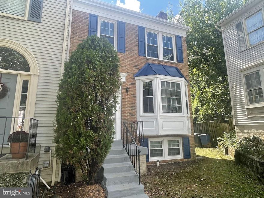 Beautifully Updated Three-Level Townhome! Freshly painted throughout, this spacious home features a bright main level with gleaming hardwood floors, a sun-filled living room with bay window, and a separate dining area that opens to a private balcony — perfect for relaxing or entertaining. The large kitchen includes an island, stainless steel appliances, and an inviting sunroom-style breakfast nook with skylights and walls of windows that fill the space with natural light.

Upstairs, the primary suite offers a walk-in closet and a private bath with soaking tub and separate shower. Two additional bedrooms and a full hall bath complete the upper level.

The fully finished walkout basement offers a generous family room, fourth bedroom, full bath with new vanity, and laundry closet. Sliding glass doors lead to a fully fenced backyard with storage shed.

Two assigned parking spaces included. Conveniently located near shopping, dining, and major commuter routes — this home combines comfort, style, and location! Good credit required. Pets case-by-case with $50 monthly pet rent per pet.