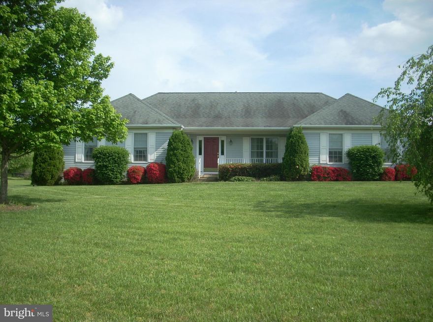 Lovely rambler on 2.48 ac. level lot w/easy access to commuter routes, shopping, medical facilities*Amenities include hardwood floors, gas fireplace in cozy great room, main level bedroom w/huge walk-in closet & private bath w/oversized soaking tub, & a deck off the kitchen dinette area to watch the sunrise & a front porch to watch the sunset*Property sold "as is" & shows well.