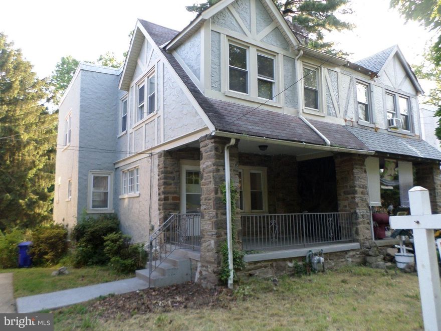 Gorgeous Stone Tudor Twin In Cheltenham School District.  An Always Desired Elkins Park Address Just Steps To Philadelphia.  This Home Backs To Scenic Tookany Creek With Unrivaled Creek Views.  Deep Front Lawn & Open Porch Provide Great Curb Appeal.  Absolute Move-In Ready !  The Interior Features Gorgeous Refinished Hardwood Floors With An Incredible Polished Glass Sheen.  Front Steel Entry Door.  Stone Fireplace In The living Room For A Comfy Ambiance.  Classic Hardwood Staircase.  Formal Dining Room With Chair Rail Moulding.  Updated Kitchen Features Tile Floor & Backsplash, Stainless Steel Sink, Gas Cooking.  Covered Balcony Just Off Kitchen.  The Second Floor Includes Three Generous Sized Bedrooms With Extra Closet Space, Two Ceiling Fans.  Designer Bathroom Updated With Exceptional Tilework, Upscale Fixtures.  Full Basement With Security Conscious Steel Door To Rear.  Economical Gas Radiator Heat.  Attached One Car Garage Plus Deep Driveway.  Freshly Painted In Neutral Hues.  Vinyl Replacement Windows. A True Value Priced Property.   Appreciate The Stream And Recreational Park Like Setting In Your Backyard !
