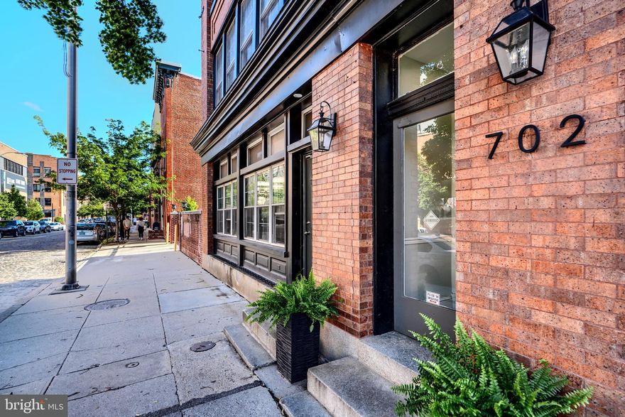 Live your best city life in this beautifully appointed 2-bedroom, 2-bath condo located on one of Fells Point’s most charming cobblestone streets. Set in a historic building and just steps from the waterfront, this home puts you in the heart of one of Baltimore’s most vibrant and iconic neighborhoods.

Inside, you'll find warm wood floors, a decorative fireplace, and a spacious, well-designed layout. The two bedrooms are situated on opposite sides of the unit, each with generous closet space and a full bathroom nearby—perfect for privacy, guests, or roommates. A small rear porch adds a peaceful outdoor space, and garage parking is included—a true luxury in this walkable area.

With unbeatable access to the waterfront, top-rated restaurants, cozy cafés, and lively bars, you’re just a short stroll away from everything that makes Fells Point so special.

This is your chance to own a stylish, comfortable home in one of Baltimore’s most beloved neighborhoods—don’t miss it!