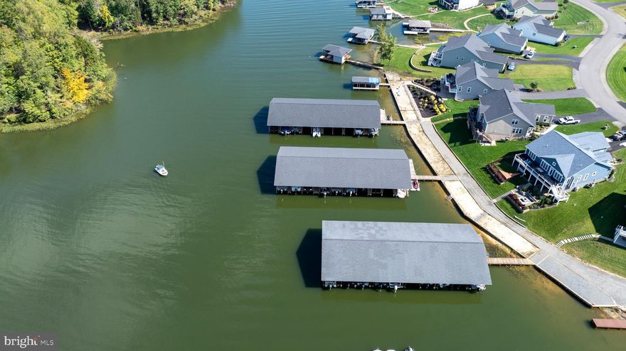 Nestled in the heart of a vibrant lake community, this exceptional piece of land offers the perfect blend of recreation, relaxation, and resort-style living. Enjoy exclusive access to a host of premium amenities including a grand clubhouse, an expansive swimming pool, a fitness center, and scenic walking trails that wind through the natural beauty of the area.

For water enthusiasts, your assigned covered boat slip ensures effortless lake access all season long. Disc golf lovers will be thrilled with the professionally designed 45-hole disc golf course, one of the finest in the region—ideal for both casual players and competitive athletes. The community also features pickleball and basketball courts, perfect for staying active and enjoying friendly competition.

Once your dream home is built, enjoy direct views of the lake! Did I mention lawn care is included? It's a perfect perk for both full-time residents and vacation homeowners who want a low-maintenance lifestyle without sacrificing curb appeal, allowing you to spend more time on the water.

Whether you're planning a weekend retreat or your forever home, this property offers a rare opportunity to live where every day feels like a getaway.