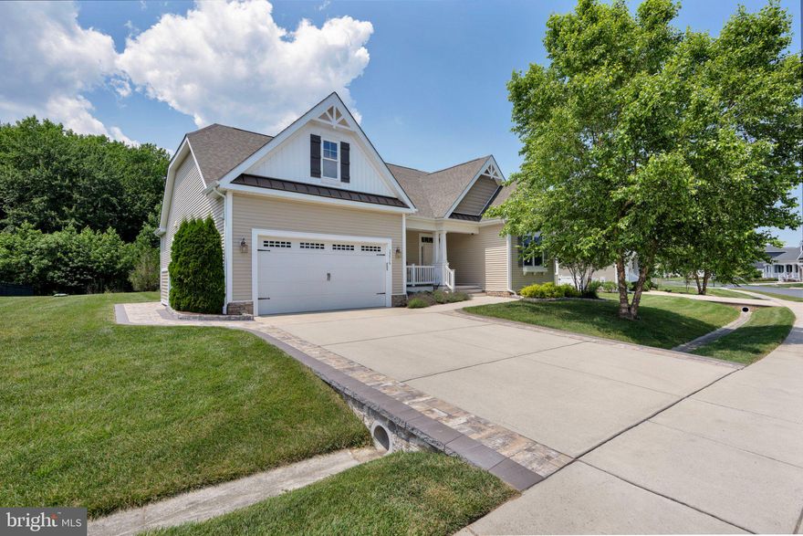 Tucked inside the sought-after community of Sawgrass at White Oak Creek, this beautifully maintained Schell-built Whimbrel floorplan offers the perfect blend of comfort, space, and lifestyle—all set on a premium lot with tranquil pond views in the front and a private wooded backdrop in the rear.

Step inside to discover a bright, open first floor with soaring 10-foot ceilings and a thoughtfully designed layout. The main level features three bedrooms, including a spacious primary suite with an en suite bath, offering convenient one-level living. In addition, a dedicated home office on the first floor provides the ideal space for remote work, hobbies, or a quiet retreat. The upgraded kitchen is a standout, complete with granite countertops, abundant cabinetry, and generous storage—perfect for both everyday living and entertaining. Just off the main living area, a 12x17 sunroom invites natural light and provides the perfect place to relax, while the cozy gas fireplace adds warmth and charm.

Upstairs, you’ll find a versatile loft space paired with a fourth bedroom—currently used as a music retreat—making it ideal for guests, creative use, or a second living area. An additional large storage space offers the potential to be finished into a third bathroom or expanded living area.

Out back, the private, tree-lined yard is designed for entertaining and unwinding, featuring a hardscaped paver patio and fire pit—perfect for gatherings or peaceful evenings under the stars. The home is also equipped with an irrigation system supported by its own private well, helping keep the landscaping lush without making your water bill higher.  A dual system heat pump was installed last Aug. 

Sawgrass at White Oak Creek stands out as one of the area’s few truly gated communities surrounded by trees and preserved land, offering exceptional amenities including two clubhouses with pools and fitness centers, plus pickleball, tennis, basketball, and bocce courts. The HOA covers lawn maintenance for both the front and back yard, along with mulching, weeding, and hedge trimming—making for an easy, low-maintenance lifestyle.

Ideally located just a short 10 min drive to both Rehoboth Beach and Lewes, you’ll enjoy easy access to coastal attractions, dining, shopping, and outdoor recreation. Everyday conveniences are just minutes away as well, including Safeway grocery store, First State Brewing, Pizza Kitchen, and Poke Bros—all without needing to hop on Route 1. 

If you’ve been waiting for a move-in-ready home that truly has it all, this is it.
