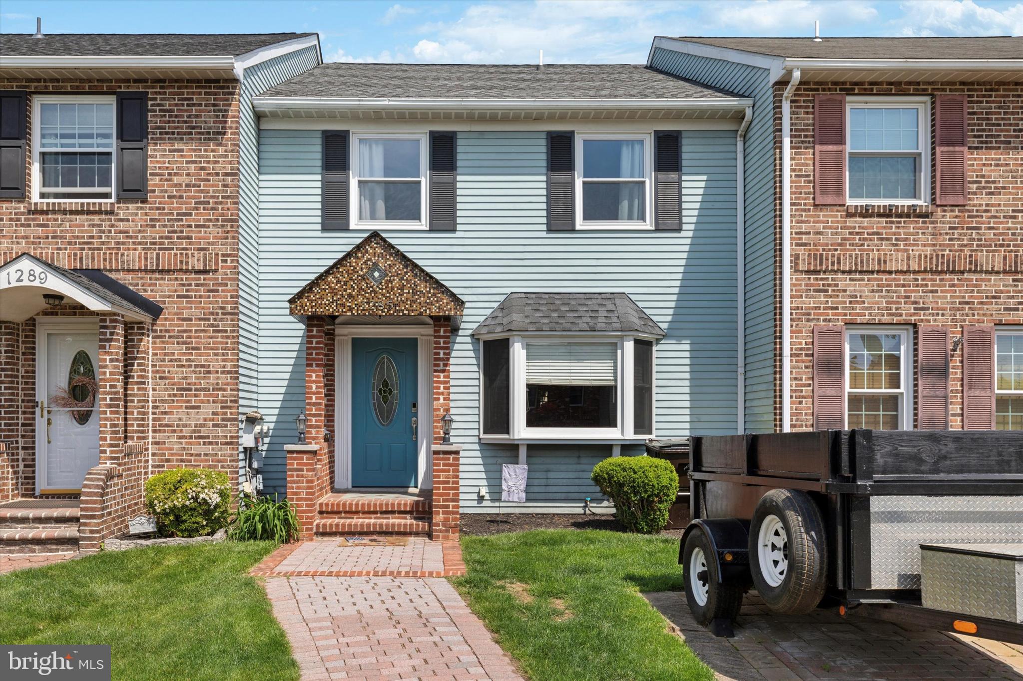 Your new home in Hatfield Township just hit the market! This charming 3 bedroom, 1.5 bathroom townhome offers 3 levels of finished living space, 2-car parking, and a fantastic backyard to its next owner! The main level begins with a living room with large bay window allowing lots of natural light to pour in, followed by the powder room and open kitchen/dining area, providing flexibility in how to layout the living space to best suit your needs. Kitchen features include granite counters, tiled backsplash, built-in microwave, and electric double oven range, with built-in shelving wall diving the space. Upstairs, the sleeping area includes 3 bedrooms with ceiling fans and hall bathroom with tub shower and oversized vanity. Head downstairs to the fully finished basement with tile flooring, an open space to create a family room, play area, office space - your choice! You'll also find plentiful storage and the laundry room with stainless steel sink and cabinetry. Back on the main level, follow the double French doors to the large fenced backyard that is an amazing space to enjoy and entertain family and friends! It begins with a covered deck with ceiling fan and an adjacent paver patio, lots of space for seating, grilling, and dining. There's also a greenhouse with planting area, large shed at the back for plentiful storage, and grass area for playing. If you're home shopping in the Hatfield area, be sure to add this one to your list! Schedule a showing and make your offer before it's gone!