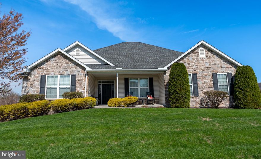 Schedule your showing, this one will not last long! 2011 Greth Home, literally brand spanking new! 219 Pleasant View Dr, Douglassville, PA in the Wood's Edge Development. This community has an HOA with many perks. Are you the tennis pro, bringing the kids to the playground, enjoy shooting hoops or just walking? This is the place for you, and so close to major routes. 
Come see why this beauty is the one you'll want to call home! From the well-maintained mature trees & shrubbery, the lovely covered front porch is just the beginning. Upon entering the home, you'll notice a roomy foyer with hardwood floors, crown molding, a powder room, and the convenience of a coat closet. Off to the left two spacious, carpeted bedrooms one with a walk-in closet and the other is a sliding door with ample space for your storing needs.  A full hallway bathroom, tile flooring, with the attire of a plano window, a glass walk- in shower w/seat, marble top Canterbury style vanity and a linen closet. Off to the right of the entry is a formal dining room with hardwood flooring, crown molding with access to the kitchen. This room sets the mood for those romantic dinners to lovely holiday dinners with family and friends. This home impresses with an open-concept floor plan! The gourmet kitchen allows the easy flow through-out to interact with family & guests. The kitchen & breakfast/dining has beautiful hardwood flooring, sliders to the covered deck with stairs to the large backyard! The kitchen is a chef's dream equipped a natural gas range, stainless steel appliances. Corian counter tops w/counter seating; beautiful white cabinetry, under cabinet lighting and featuring a large island housed with electric & under island storage. sliding door pantry and even an area for a coffee bar! 
Let's check out the spacious, carpeted living room, featuring a beautiful natural gas fireplace, surround sound, the living room windows have the luxury of a remote for the blinds for all four windows. Moving on to the sizeable Primary suite located off the kitchen. The primary has two closets one being a walk-in.  An en-suite has a tiled, open shower, bath-linen closet, double sink vanity recessed lighting.  Also, on the main level is a roomy laundry room with the washer and dryer included. deep sink and white cabinetry. The garage is equipped w/ garage door opener, peg board for tools, a work bench, a cubby for larger tools. 
An 8-lite glass door leads the way to the finished basement. You'll notice the opulence of the textured, looped carpeting throughout the main living area. This area will amaze you from the mounted Murphy bed w/desk, dining area, pool table, wet bar, bar mini fridge, large windows with decent sized ledges. sliding glass doors lead to yet another patio. The basement is huge; no, we aren't finished yet.  Storage under the stairs and an unfinished area with shelving, a utility /mechanical room; a natural gas, 2-zoned HVAC w/ Aprilaire  Humidifier Controller, a natural gas hot water tank, radon reduction system, sump pump. Last but not least...another full bathroom!! A walk-in shower w/glass shower door, white tiled, oversized vanity.  Let's step out to the backyard, this could definitely be your oasis! The large, covered deck is perfect for morning coffee or entertaining. This home is truly a move-in ready home! 
The only wants I could think of is...Imagine, the lower patio would be great for that hot tub! The backyard is perfect for the inground pool you've always dreamed about! Endless possibilities! Schedule today!