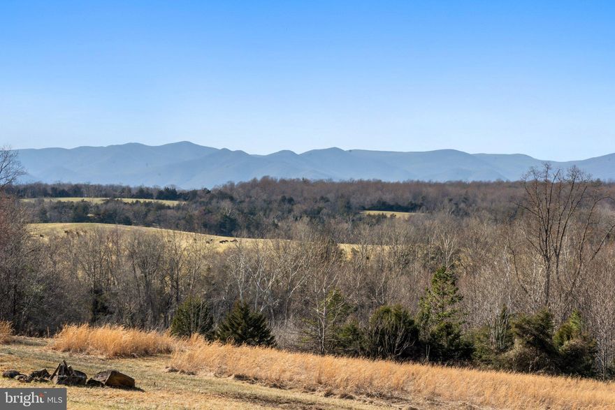 Open House Saturday May 17th 12-2pm STUNNING and hard to describe. Pictures and words just won't do it justice. Must see in person. 

One-of-a-kind property set on 15+ ACRES with truly priceless views and aura. Just a visit is a majestic experience.

Surrounded by 1000 ACRES of undeveloped land. 300+ acre farm encompasses the left and rear sides of the property. Nearly 400-acre family-owned land encompasses the right side. 250 acres in the rear is owned by James City Historic Properties. Piece of history: an old colonial period stagecoach road ran along the edge of this property. The property offers a beautiful, new canvas every day. Breathtaking views can be seen from all three levels of the house. Rolling hills. Tree lined pastures where the cattle roam. UNPARALLED mountain views. Very rare. Stunning fall foliage colors. Nothing to be seen but God's beauty of creation. Can you imagine taking in the next 10,000 vistas / sunsets here? 

STUNNING!

Nestled away at the end of a no outlet, state-maintained road it's hard to believe such a property exists only 10 minutes to downtown Culpeper. 4200+ SQ/FT home that is deceptively large. 4 bedrooms 3 1/2 bathrooms. In-ground pool. 2x6 exterior walls for superior energy savings. Attached 2-car garage. Top of the line garage floor finishings. Detached, oversized 2-car garage with electric, water, and 50amp connection.  Have your family gatherings here. Plenty of room for guests. Room to build a guest house. Ample parking. Plenty of room for animals / livestock. A must see in person.

MAIN LEVEL MASTER SUITE. Main level laundry. Office/den/school/flex room. ANDERSON windows. Custom kitchen with over cabinet lighting. Gas range. Gas fireplace. Gorgeous picture windows. Luxurious plantation mahogany front door. Petersburg ash wood flooring. HUGE basement with kitchenette and 4th BEDROOM. New dual fuel heat pump system. Top of the line carpet and padding with stain and odor protection. Top of the line Sherwin Williams paint. Upgraded trim. Custom built stair rails. Upgraded fixtures. Slate flooring. Imported Turkish, Mediterranean marble floor tiles. Designer marble tiles. Upgraded garage doors and openers. Eat-in kitchen with custom cabinetry and barstool seating area. Waterfall countertop. BEAUTIFUL DECK just off the kitchen. 52" black aluminum fence. New interior / exterior light fixtures. New landscaping, mulch beds, and yard seeded and strawed. New pool hardware. New pump. New pool filter media. Pool being maintained by Pool Blue. Stone wall was built from an old log cabin that once sat on a neighboring property. Oversized fire pit for relaxing and soaking in the vista. Septic inspection completed: passed. Pest inspection completed: passed. Radon mitigation system installed. Reports available upon request/uploaded in MLS. Home treated inside and out for pest control. Seller willing to build out closets as desired. Trees trimmed. Grounds cleared. Grading done. Move-in ready. Time to move-in!

4 miles to Ole Country Store. 20 mins to Yoders. 40 mins to Charlottesville. 45 mins to Shenandoah National Park. 75 miles to D.C. Winers, distilleries, and breweries in abundance. 15 mins to the highly renowned Culpeper dining and shopping experience of East Davis Street AND all the annual downtown events they offer. Experience the country life with great proximity to so many amenities. Come visit and enjoy the experience. Hope to see YOU! 
Photos virtually staged. PLEASE wear provided shoe covers.