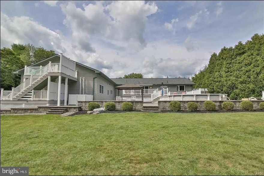 The opportunity to own your very own oasis is here! Presented here is the perfect family home which features a main home, separate apartment and In law suite all in one. The main home has 3 bedrooms and 2 bathrooms. When you walk into the main home you will notice the open floor concept with beautiful Brazilian Teak hardwood floors, natural lighting throughout, solid wood trim windows and doors. The main living room, dining room, kitchen with center island, farmhouse sink and butlers pantry are all designed and finished with thoughtful touches and fixtures. Through the dining room sliding glass door you can access the patio which leads to a fenced backyard with an above ground pool, outdoor lounging area, and a barbecue grill. This level also has the master bed and bath, 2 bedrooms with walk in closets and another full bathroom and full laundry. Moving on down to the basement will not disappoint. The basement has a large siting area, air hockey table, ping pong table, foosball table, gym and theatre room. There are also a few extra rooms for storage and utility. 

The Upper Level Apartment Unit: - The upper-level apartment unit features a living room, bathroom and a bedroom and numerous sky lights to allow natural lighting. 

The in-law suite has its own separate entrance. The in-law suite features a living room, kitchen, 2 bedrooms and 2 bathrooms. The entire in-law suite has been renovated in the past year with costs over $100,000. Updated with new flooring, cabinets, finishes, fans, plumbing, electric, and fixtures. 

We are still not done! This property sits on over an acre of land. Driving up you notice the large driveway which easily fits 8 cars and another 2 car garage. This home features paver patio walkways, multi-level composite wood decking with white vinyl railings, lounge area, above ground pool with deck, outdoor kitchen area with covering canopy, outdoor pavilion, stone walls, and 2 sheds. There is so much that can be done such as expanded outdoor kitchen, dedicated stone fireplace area, playground and the list goes on! To sum this beautiful home and property up is that this could be your own families oasis. Schedule your showing before it’s too late!