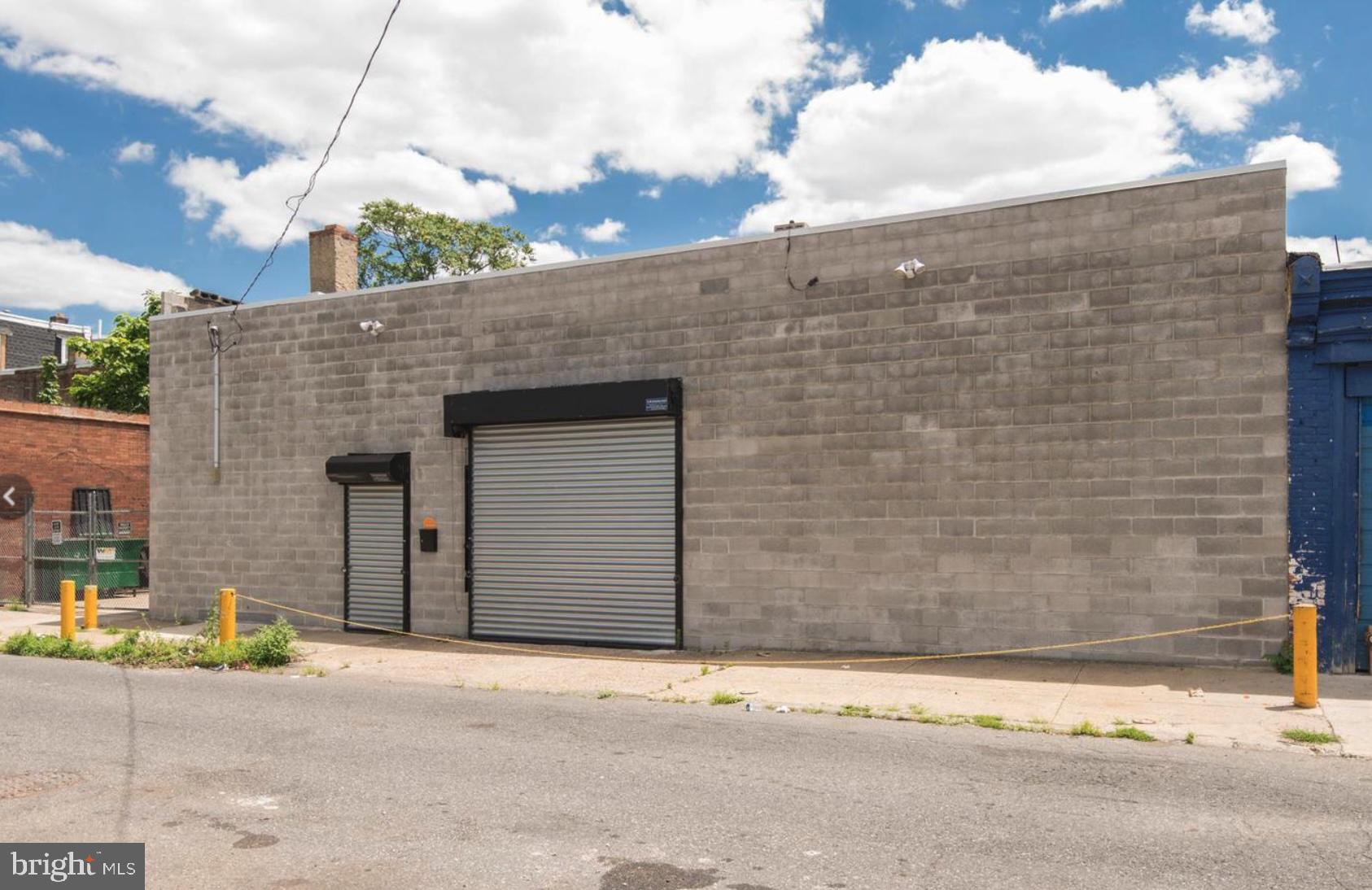 5,600 SF CMX-2 single-story warehouse is now available just off the busy intersection of Broad Street and Hunting Park Avenue, ideally situated behind a high-traffic retail strip center. This turn-key space features drive-in doors, newer roof with 16” on-center joists, two bathrooms, office space, mini-split HVAC systems, electric and plumbing. Located within a Qualified Opportunity Zone (QOZ), the property offers excellent potential for a variety of commercial uses. Zoning and permitted use to be verified by the buyer.