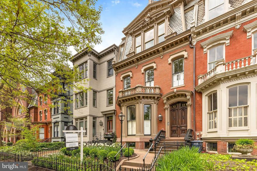 Unveiling this extraordinary 5-bed, 5-bath residence with secure parking, an elevator and more than 4,000 square feet of living space that has been exquisitely reimagined within the timeless walls of a Victorian row home. Originally crafted as part of The Gaslight District collection, this is a rare opportunity to reside in the most iconic luxury boutique building in Logan Circle, a true gem that stands as a testament to sophistication and exclusivity. This property transcends the ordinary, offering an unparalleled living experience in a secure and private environment. This residence, a magnificent fusion of two units, is the perfect pied-à-terre, your coveted DC base, or an ultra-exclusive primary residence. This show stopping trophy property is ready for all of your entertaining needs for your next event. 

Beyond the opulent entrance, revel in the sumptuous sitting/dining area, featuring a built-in bookshelf and a decorative fireplace that leaves a lasting impression. Continue through the magnificent kitchen adorned with pristine white cabinetry, state-of-the-art appliances, and an adjoining dining area. On this floor you’ll also discover two bedrooms, each boasting its own ensuite bath and one with a balcony.

Ascend to the next level, dedicated entirely to a primary suite, designed for ultimate privacy – a true oasis with its own ensuite bath, two walk-in closets, and elevator access. Your journey continues into a lavish whiskey lounge equipped with a beverage cooler and custom cabinetry, plus a sun-drenched living room. 

Relish the fresh air and panoramic views from your PH roof deck, the pinnacle of luxury living. Another primary suite, with a spa-like ensuite bath, and an additional bedroom doubling as a home office, complete this extraordinary residence. Step out your front door to discover award-winning restaurants, boutique shops, swanky cocktail bars, picturesque parks, and more. Set within a timeless Victorian row home in Logan Circle, 1314 Vermont Avenue NW presents a one-of-a-kind opportunity to redefine city life on your terms. Seize this rare chance to call a piece of DC history your own – an exclusive residence that allows you to live a life of grandeur.