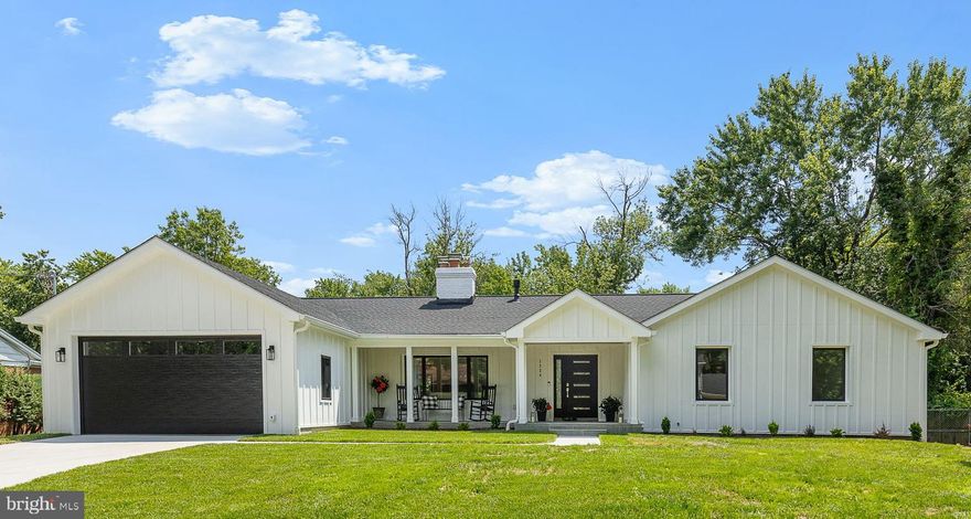 Welcome to 1324 Kingston Ave - a fully renovated luxury home offering  single-level living and lots more - in Alexandria!

This fully renovated residence is located in the highly desirable Ballantrae neighborhood of Alexandria. Completed in 2025, the expansive home showcases over 5,000 square feet of meticulously finished living space. Set on a spectacular 0.6-acre lot on a quiet, no-thru street, this property delivers the perfect blend of relaxed living, elegant design and modern convenience.

Inside the home, you will find 7 spacious bedrooms, 5 full bathrooms, and 1 stylish powder room, all thoughtfully designed for comfort and functionality. The heart of the home is the gourmet kitchen, outfitted with custom cabinetry, gleaming quartz countertops, and premium Jenn-Air RISE appliances—including a 48” dual fuel range with griddle and double ovens, 36” built-in refrigerator, dishwasher, and under-counter microwave. A stunning butler’s pantry adds even more space with a second dishwasher, glass-panel cabinetry, and a walk-in pantry.

The open living room is a true showstopper, featuring vaulted ceilings, decorative wood beams, floor-to-ceiling windows and doors, a custom wet bar and a striking linear fireplace (one of 4 fireplaces in the house). The primary suite is a private sanctuary with high ceilings, a luxury en-suite bathroom, large walk-in closet, coffee bar, sitting area, and direct access to the rear deck. The spa-like primary bath boasts a soaking tub, oversized walk-in shower, double vanity, and a private water closet.

The lower level offers a full kitchenette, two large family areas, abundant storage, and an additional set of washer/dryer hookups —making it ideal for guests, entertaining, or multi-generational living.

Outside, enjoy evenings on the screened-in porch with a gas fireplace, wood ceiling and retractable Phantom screen - allowing the screen porch and open deck area to be combined into a single, open space for entertaining. The patio below is perfect for a firepit and all outdoor areas take advantage of the serene and private expansive backyard.  And, if you've always longed to have a pool or a sport-court or an extensive garden, you have the land to do any or all of the above!

This is a rare opportunity to own a completely reimagined and expanded luxury home in one of Alexandria’s most coveted neighborhoods. Experience timeless elegance, superior craftsmanship, and contemporary living at its finest.