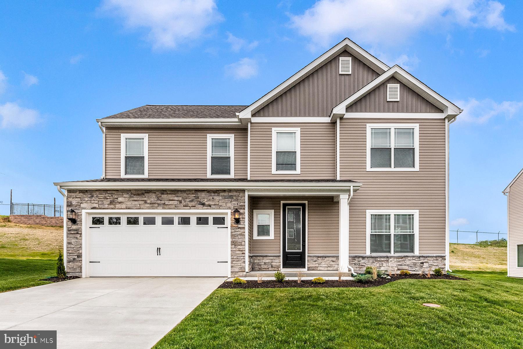 Your Next Chapter Begins in The Erie
Imagine waking up in a home that feels like it was built just for you. The Erie isn’t just a house – it’s where everyday moments turn into lasting memories.
From the moment you step onto the welcoming front porch, you’ll know you’re home. Inside, light fills the open living spaces, where the kitchen, dining, and family rooms flow together, making it easy to stay connected with the ones who matter most.
Hosting friends? There’s room for that. Quiet night in? You’ll love it even more. With modern kitchen finishes, a clutter-busting mudroom, and spacious bedrooms upstairs, every detail is designed to simplify your life while surrounding you with style.
The Erie – where life happens beautifully.