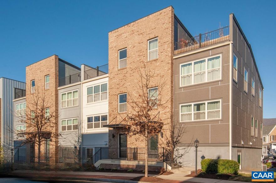 MODERN TOWNHOME IN SOUGHT AFTER OLD TRAIL FEATURES 4 BR & 3.5 BA WITH STUNNING MOUNTAIN VIEWS FROM ROOFTERRACE. Location is prime and walkable to everything Old Trail and Crozet have to offer. Only 15 minutes from Downtown Charlottesville and UVA. Built by Southern Homes this contemporary townhome features an open concept kitchen, living and dining area flooded with natural light. Expansive eat-in kitchen with granite countertops, 42-inch maple cabinets, and stainless-steel appliances is perfect for modern day living and entertaining. Home boosts a master suite and guest suite with optional home office locations. Townhome provides a 2-car garage, deck off the main level and a roof top terrace. HERS Index Score of 65, meaning it is 35% more energy efficient than a standard new home, guaranteeing energy efficiency and maximum utility savings.