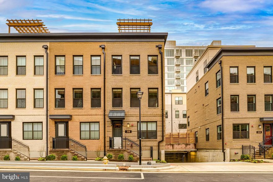 Welcome to this modern masterpiece that is rarely available at The Venue! Built in 2022 on the site of the historic Old Dominion Glass Works site, this beautiful townhome offers modern design with the charm of a historic setting. 

Discover luxury living in this contemporary, end unit townhome with Whole Home Automation that can be controlled remotely. The nine and ten foot ceilings create instant appeal. As you walk into the home, enjoy the perks of having a flex room that can be your own in-home office suite. The main level boasts of an open floor plan with oversized windows creating a majestic yet warm scene. The heart of the home showcases a gourmet kitchen equipped with the Shelf Genie organization system, a wine/beverage refrigerator, and an oversized island with chic lighting. A perfect spot for casual dining! The 2 car garage has a storage system, epoxy floor, bike mounts, and more. Entertain on the fourth level with surround sound and a private rooftop terrace. The terrace features water views, speakers, wall mounted TV, outdoor kitchen, and Pergola to complete the comfort and luxury of this wonderful home. A true rare find with over $170k in exceptional upgrades at every turn!

Old Town North is the newest premier area in Old Town. It is easily one of the best kept secrets of the DC Metro area because it affords the neighborhood feel, while being centered amongst walkable dining/shopping/parks, a 10 min walk to downtown Old Town and 5 min drive to Reagan National Airport. Trader Joe’s.

Amazon HQ2 construction is well underway, located less than 2 miles north of Old Town North, expecting to complete their two 22-story office buildings and 50,000 sq ft of retail space in 2023. 

Start living your best life at 218 Canal Center Plaza!