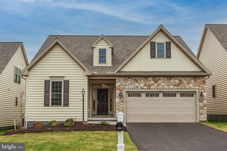 HOME OF THE MONTH ! A Brand-New & Move-In Ready Home.   30-Day or Less Close Available!
Skip the wait and start enjoying your new home now. This stunning Hartford I offers nearly 2,000 square feet of beautifully designed one-floor living with the perfect blend of comfort and style.
The open-concept layout seamlessly connects the kitchen, dining, and great room — ideal for entertaining or everyday living. The kitchen is a true centerpiece, featuring a large island, elegant quartz countertops, stainless steel appliances, gas range, and a spacious walk-in pantry.
The great room impresses with a vaulted ceiling accented by stained pine beams and a cozy gas fireplace, flowing effortlessly into a bright sunroom — the perfect spot for morning coffee or quiet evenings.
The private owner’s suite includes a generous walk-in closet and a beautifully appointed en-suite bath with a tiled shower. A second bedroom with full bath and a dedicated office/study offer flexible space for guests, hobbies, or working from home. Luxury vinyl plank flooring runs throughout the home for a clean, cohesive look.
Need more room? The full unfinished basement provides endless possibilities for storage or future finishing.
Located in the sought-after 55+ community of Honeycroft Village, residents enjoy sidewalks, streetlights, public water and sewer, and an exceptional clubhouse featuring: State-of-the-art fitness centerHeated,  indoor pool & spa, Gathering areas, showers & lockers
Bocce ball, horseshoes & pavilions, Hardscaped fire pit area,  Raised community garden bedsEnjoy a vibrant, low-maintenance lifestyle where lawn care, snow removal, and community amenities allow you to focus on what matters most.
Taxes currently reflect land only. Home assessment TBD.Visit the on-site agent at 618 Greenbriar Path for open house details.