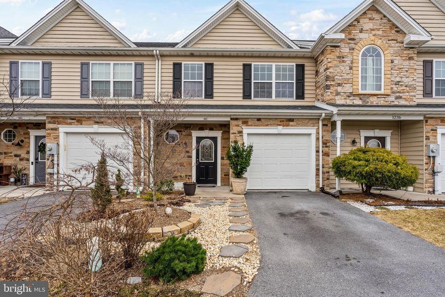 GORGEOUS townhome in Popular Rolling Hills! With over 1800 sq ft of finished space the main level features wide open living areas including a spacious KT with tons of cabinet space, beautiful granite counters, shining SS appliances & a breakfast bar. The KT flows right into the dining area and the living room that is drenched in beautiful natural lighting. Upstairs find 3 BDRM/2 BA including a stunning primary suite with tray ceiling, HUGE walk-in closet & attached bath with dual vanity. Additional bonus area is the perfect spot for a rec room, office, playroom, etc.! Upper level laundry (W/D included) for your convenience. Modern LVP flooring & paint throughout the home makes this one truly turn key!! The outdoor space will IMRESS-backed to the tree line for maximum privacy the rear patio is the perfect place to entertain or relax in peaceful bliss. LOW maintenance landscaping gives you not only beautiful plantings thru the seasons but more time to slow down and enjoy your time at home. This amazing, established community is convenient to award winning schools, shops, dining & interstates. Don't miss your opportunity on this one!