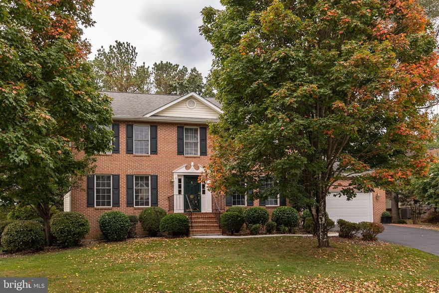 Welcome to 234 Asbury Rd, Winchester, VA 22602 – a stunning brick-front residence nestled in the established and sought-after Pioneer Heights community.

This spacious home offers over 2,700+ square feet of beautifully finished living space, thoughtfully designed with both entertaining and everyday comfort in mind.

The main level showcases a traditional layout with gleaming hardwood flooring, featuring a formal dining room and formal living room, both ideal for hosting gatherings. The heart of the home is the expansive kitchen, complete with a custom oversized island topped with granite counter, perfect for cooking, dining, or entertaining!  Adjacent to the kitchen, you’ll find a sunny eat-in breakfast area and a cozy family room with an inviting gas fireplace—creating the perfect atmosphere for relaxation.

Upstairs, the generously sized primary suite offers a peaceful retreat with vaulted ceilings, a spacious layout, and abundant natural light. Three additional guest bedrooms share a full bath, and the conveniently located laundry room adds everyday ease to the upper level.

The finished basement provides even more versatile space, featuring a large recreation room ideal for a home theater, gym, or office, plus a wet bar and half bath for added convenience. There's also a sizable unfinished area offering excellent climate-controlled storage and a walk-up to the private backyard.

Step outside from the family room onto the luxurious screened-in porch, where you’ll enjoy serene, wooded views—a perfect spot to sip your morning coffee or unwind on a crisp fall evening. 

Additional highlights include a two-car garage, and a beautifully landscaped 0.28-acre lot, this home truly has it all—space, comfort, functionality, and style—all in a fantastic location. This home sits just minutes from Winchester City, and major commuting routes i.e rte. 7, 522 and I-81.

Recent property improvements include brand new carpeting in family room, and entire top-floor level. Brand new LVP Hardwood in the primary bath, As well as fresh paint throughout the homes main & 3rd floors! This home exudes ownership pride! Don’t miss the opportunity to make it yours! Schedule a private tour today!