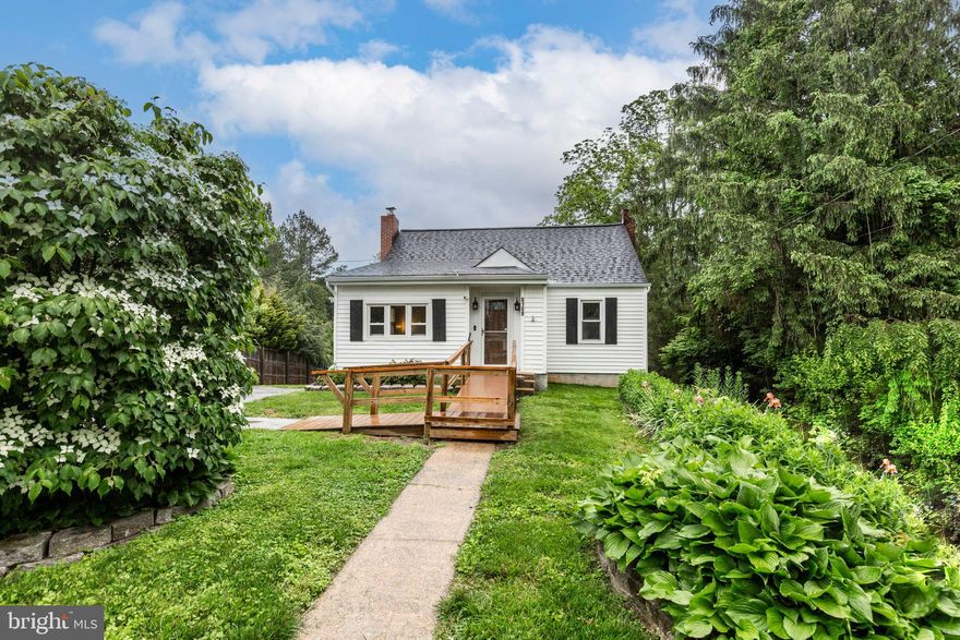 This 2 bedroom, 2 bath home features a main-level bedroom and full bath, perfect for guests or convenient one-level living.  Step outside to a large deck overlooking a spacious, private yard, ideal for entertaining or unwinding. Whether you are looking to expand your rental portfolio or create your own cozy retreat, this property offers endless potential in a desirable location.  Don't miss out!!