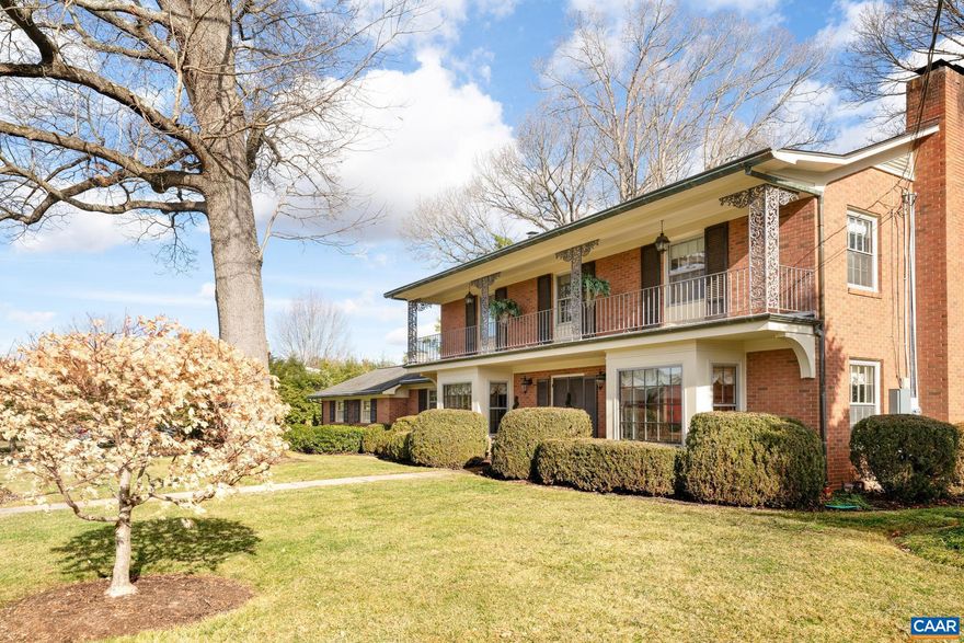 This traditional 4-bed, 3.5-bath brick home with mountain views, nestled in the prestigious Fairway Hills neighborhood, is ideally located just a short walk from the Orchard Creek Golf Course and mere minutes from downtown Waynesboro and the Interstate 64 junction. The property charms with classic, tasteful design elements, including gleaming hardwood floors and wide molding; modern conveniences such as a whole-house generator and irrigation system; and a thoughtful, livable layout. The main level offers an elegant entryway that opens to a grand living room and formal dining room, along with a sunroom, den with built-in cabinetry, kitchen outfitted with cherry cabinets and granite countertops, and master bedroom with full bath. The second level is comprised of another main bedroom with ensuite bath and custom closets, two additional bedrooms, and a third full bath. The walkout basement, featuring a high-end home theater with fireplace and wet bar, a second kitchen, a powder room, and a rec room, makes for a cozy alternative to the more formal entertaining space on the main level. A screened porch and patio offer the perfect vantage points to enjoy the serene and manicured yard with mature oak trees.,Cherry Cabinets,Granite Counter,Fireplace in Basement,Fireplace in Living Room