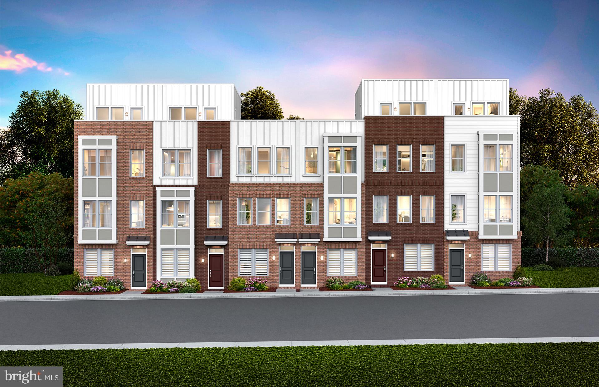 The 4-level Baywood Way townhome with 1,791 square feet. The home offers 3 bedrooms, 4th floor loft & rooftop terrace for outdoor entertaining or soaking in the sun, and a 2-car tandem garage. The open concept main level features a large center kitchen island and included deck off the kitchen The Primary Suite offers sizable dual walk-in closets and on the same level you will have spacious secondary bedrooms and a convenient walk-in laundry room. Farmstead District in Rockville, MD is a blend of modern living while offering everything right outside your front door. This community offers 370 new homes and Pulte Homes will be offering 212 home at Farmstead offering both 4-level townhomes and 2-level condos. Upscale community amenities await residents—a symphony of convenience and leisure. Imagine living under 1 mile from the Shady Grove Metro with easy access points to I-370 and I-270, your daily commute becomes a breeze. The vibrant tapestry of 270 Center, RIO, and Downtown Crown lies just minutes away, inviting you to explore, dine, and savor life’s little pleasures. But it’s not just about proximity; it’s about the rhythm of everyday living. Take a leisurely stroll to Upper Rock Circle, where culinary delights await. Cava, CVS, Mom’s Organic Market, Nums Yums Bakery, Safeway, Coffee republic, Botanero Wine Bar, Nagoya Sushi, and Firehouse Subs. Just outside, you are steps from pickleball, tennis, basketball, the dog park and everything J.T. Stepanek park has to offer!
But wait, there’s more—a hidden gem that ties it all together. The Barn, Farmstead District’s community center, offers a modern fitness center, seasonal pool, fire pit, grills, and multiple seating areas. With room for year-round entertaining, the Barn is designed to elevate your everyday living experience.