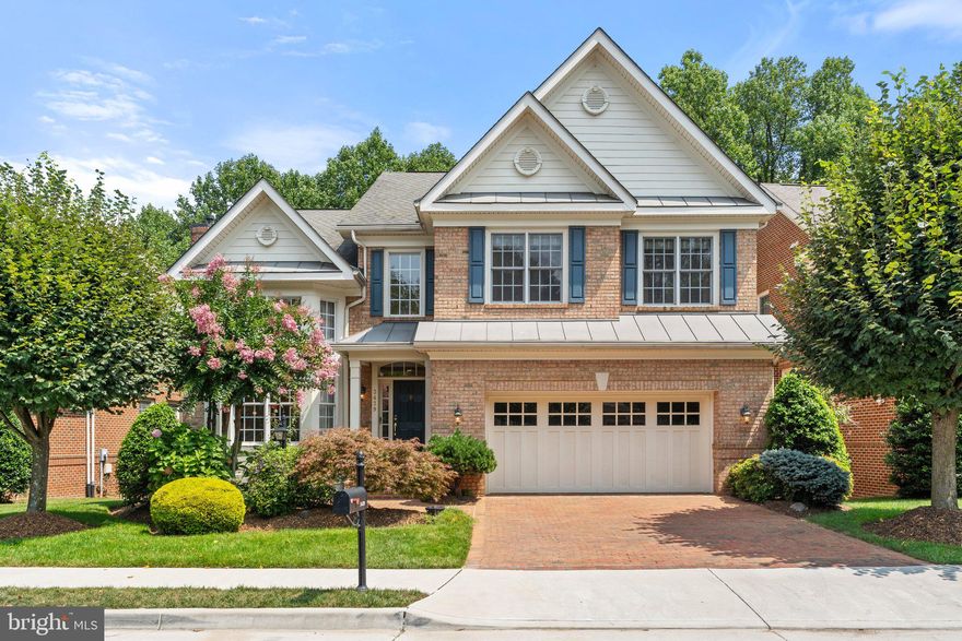 Welcome to 3439 Preservation Drive! This lovingly cared for home enjoys a beautiful, landscaped setting in Pickett's Reserve backing to wooded common area. Features include three finished levels, 6 bedrooms and 5 full baths. The open concept main level plan includes a Living Room with double stacked bay windows and 2 story ceiling, a Dining Room with bay window, and a Family Room that shares a 2 sided fireplace with a multi-windowed Sunroom. .. plus a main level Bedroom and Full Bath. The chef's kitchen has "Monogram" appliances,  granite countertops, center island and breakfast area with bay window. Solid oak floors on main level, stairs up and upper level. On the upper level there is a Primary Bedroom Suite with trey ceiling, a 2 sided fireplace with step down to the Sitting Room plus a luxury bath with soaking tub, double vanities and walk-in shower. Bedroom 2 has an ensuite bath + ceiling fan. Bedroom 3 and Bedroom 4 share a hall bath. 
Lower level includes walks out to a blue stone patio and lovely yard. There is a large finished Recreation Room with a gas fireplace and wet bar plus a 6th bedroom and full bath. In addition, a large unfinished room is perfect for storage, workout area or workshop.

Pickett’s Reserve is a uniquely beautiful community of 88 semi-custom homes. All homes are built with 4 sides brick or brick & stone and feature Wayne Dalton “Equestrian Series” wood garage doors. Brick extends to the driveways, crosswalks and lead walks. The large variety of house types and facades is not often found in newer communities and definitely sets Pickett’s Reserve apart from other neighborhoods. With a land plan that emphasizes curvilinear streets & sidewalks and with an abundance of landscaping and street trees, the natural setting is complemented by the varied architecture of 88 homes. Community paths wind through stone gazebos and lead to an adjacent 15 acres of Fairfax County parkland. Ideally located on the eastern edge of Fairfax City, Pickett's Reserve is just a few miles from historic Fairfax City, the Vienna Metro, 495, 66, Tysons, the Mosaic District and Fairfax Inova Hospital.