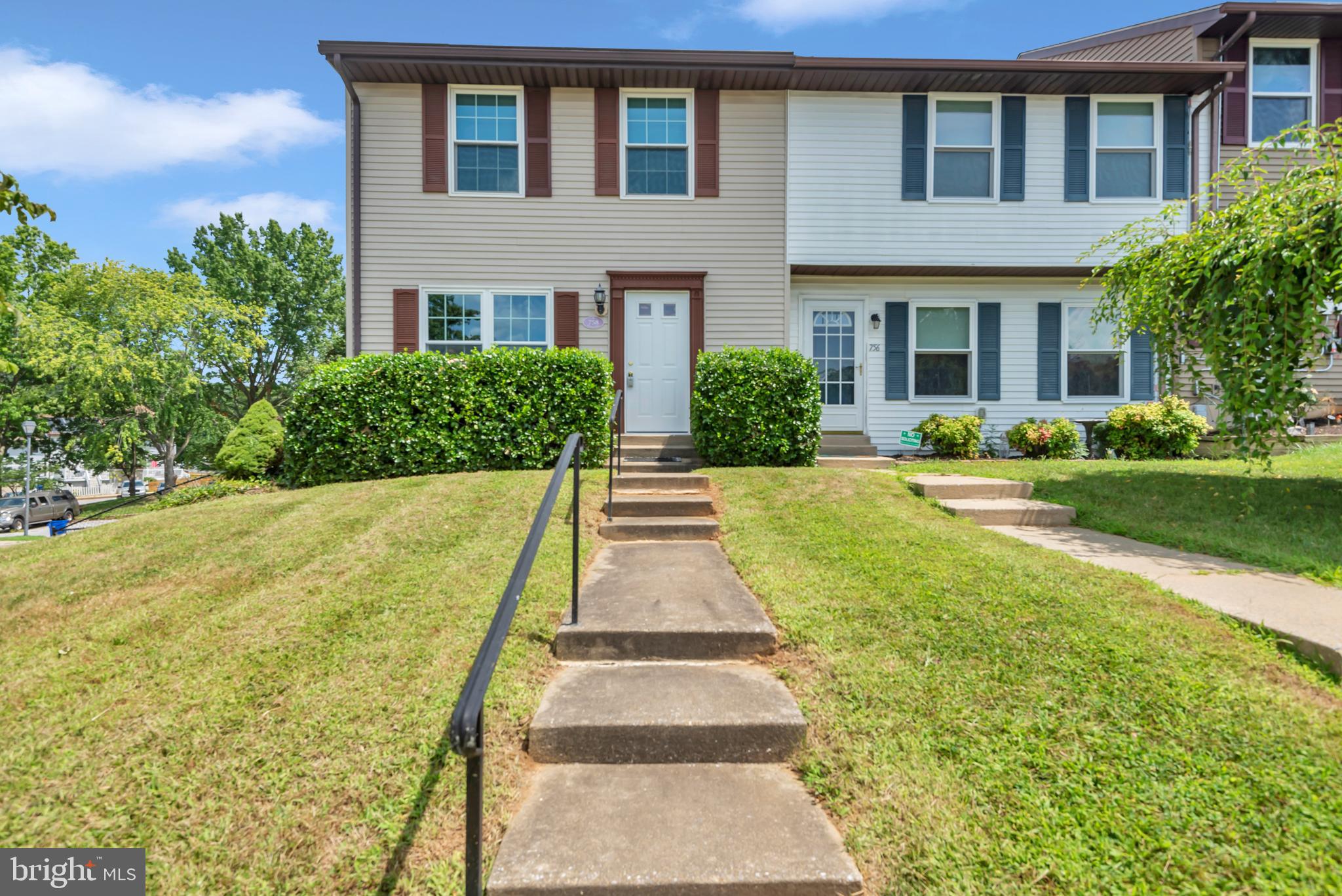 Welcome to this exquisite end of row townhome. Open concept with many upgrades such as new flooring throughout the main level, new roof 2024, water heater 2025, refrigerator & dishwasher 2025, new stove 2021, new fence in 2022 and doors were installed in 2023 with a lifetime warranty that passes to the new owner. The kitchen has a breakfast bar, all new appliances and a large, shelved panty. The dining room has patio door leading out to your large private 16 x 16 deck. This home has parking in the front and the back. Homes needs paint to make it your own!