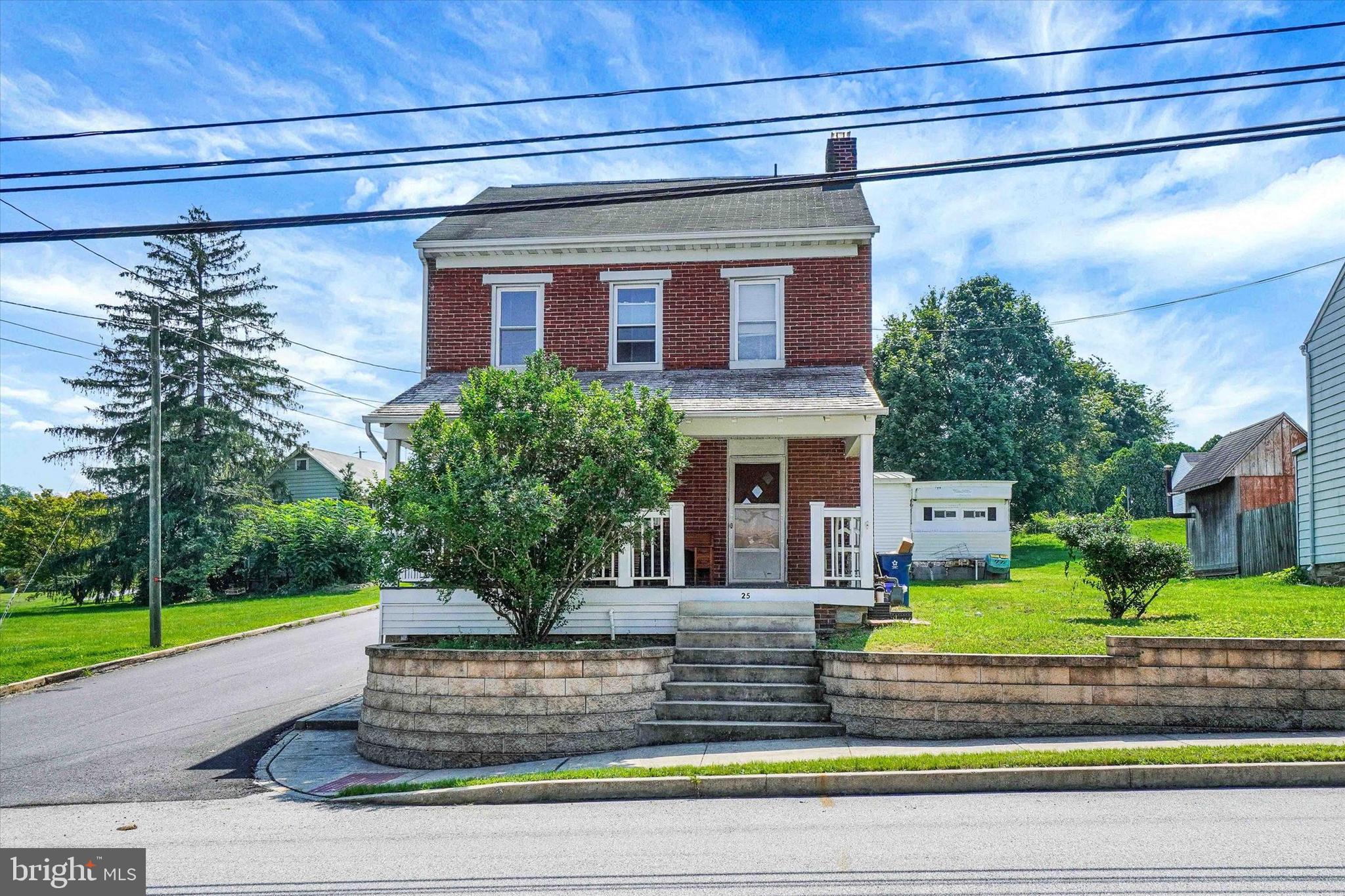 Thank you for taking the time to explore 25 N Main Street in Loganville. This charming all-brick colonial offers three bedrooms and one full bath, along with a welcoming covered front porch and a rear deck—perfect for relaxing or entertaining. In addition to the main home, the property includes a detached two-bedroom mobile home, ideal for rental income or extended family and guests. A detached two-car garage sits at the rear of the property and is currently rented for $435 every three months on a verbal lease through the end of September. Both the main home and the mobile home have separate gas and electric meters. This property presents a great opportunity for a large family or anyone looking for a flexible, income-producing investment. Mobile was rented for $950/month