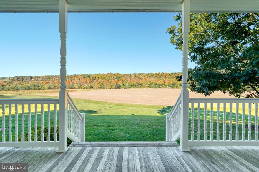 A special find of a true York County treasure. This 126 acre Gentleman's Farm in a picturesque setting, offering history, architecture, craftsmanship throughout the old and newer additions of the home and outbuildings. The original brown sandstone section was built around 1870 and is square pointed. It has hickory floors that are 1 1/4" thick and are laid on log joists. It now serves as the Formal Living Room, and a Library/Office on the first floor, along with a Bedroom, Full Bath, Sewing room, and Laundry on the second floor. The Formal Living Room has built-in bookshelves and the fireplace sports a custom designed mantle. The Library/Office has custom designed cherry built-in book shelves, desk, and computer desk - all designed by a local craftsman.  The first addition to the house occurred in 1910 and now contains the Kitchen on the first floor with a Bedroom on the 2nd. The Kitchen has a granite top on both the oversized island and countertops. The ceramic tile floors were recently updated. The Kitchen includes an electric cooktop, a dishwasher, a refrigerator/freezer and an oversized built-in microwave that includes an infrared "speedcook" technology. The 2nd floor of this section of the home offers a Bedroom.  The newest section of the house was built in 1994 and contains the Dining Room and the Family Room on the first floor along while the 2nd floor consists of the Master Bedroom, Master Bathroom, and an additional Bedroom. The large Dining Room is open to the adjacent hallway to provide sufficient space to place a 2nd dining table when entertaining a large gathering. The Family Room features a large stone fireplace which was built from the foundation stones of the property's original log cabin. It is topped with custom designed, locally built mantle. The Family Room opens to an oversized Porch with views. There are 2 porches with natural finished mahogany floors, while the patio off of the Kitchen is made of blue flagstone surrounded by a brown sandstone wall. The patio finishes in front of the koi pond and waterfall. The view from the back porch is nothing short of amazing. The porch roofs are all standing seam metal roofs. The porch roofs, the house roof, and the garage roof were all installed March 2020. The oversized 3 car garage will accommodate large SUV's or trucks if needed and also has space to serve as the mudroom with a coat closet. The basement under the newest addition to the house features workbenches and lots of space for either a workshop or it could be finished off for an additional 800 sq. ft. of living space. High Speed Internet is connected to the house and is hardwired to both the Library/Office and Family Room.  The Bank Barn was built in 1863 and contains 4 Horse Stalls on the lower floor along with plenty of storage space for feed, hay, and sawdust to service the stalls. The stalls open into a corral. The top floor consists of both the traditional open barn space with hickory floors and a modern tack room with tongue and grove pine paneling. The corral looks down to the riding ring. The property includes about 30 acres of unharvested woodland plus unharvested hedgerows. This property is not to be missed!