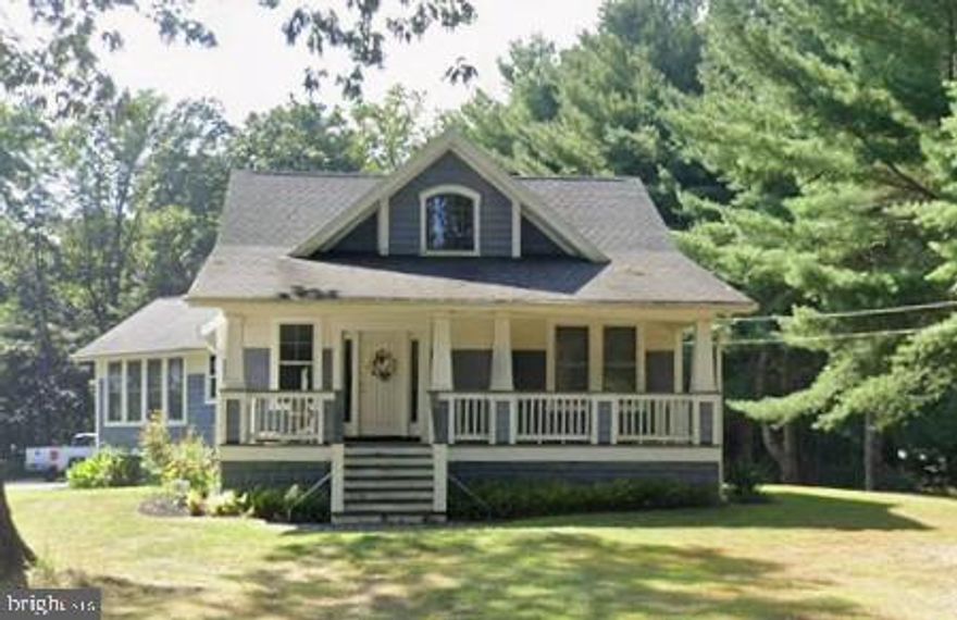 Nestled on a private 3-acre lot in sought-after Crownsville, this beautifully rebuilt home offers the perfect blend of craftsmanship, space, and versatility. Completely reconstructed from the ground up approximately 15 years ago and meticulously maintained by a contractor-owner, the home showcases quality construction and thoughtful design throughout.

Featuring 4 spacious bedrooms and 2 full bathrooms, the layout offers flexibility with 2 bedrooms on the main level and 2 on the upper level—ideal for multi-generational living, guests, or a private home office setup.

The heart of the home is complemented by a stunning sun/Florida room, filled with natural light and perfect for year-round enjoyment, entertaining, or simply taking in the peaceful surroundings.

Outside, the property truly shines. A massive 3-car garage provides ample space for vehicles, equipment, or a workshop, while the expansive driveway offers plenty of additional parking. The 3-acre lot, zoned for agricultural use, presents endless opportunities—whether you’re looking for privacy, space to expand, hobby farming, or outdoor recreation.

A rare combination of land, quality construction, and functionality—this is a property that offers both lifestyle and long-term value.