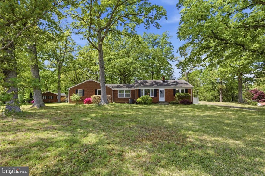 Where else are you going to find close to 3000sq ft and 5 bedrooms  for less than $500k?? This home has been well maintained and offers great size primary bedroom, as well as plus size spare bedrooms. The dining and living room are separate with large passthrough openings. 4 Bedrooms on the main level, and then additional bedroom in the basement. Basement is expansive as well with additional recreation space, office space, wash space and utility space. Don't forget about the yard and driveway space that is offers an arch driveway and plentiful room for entertainment. The garage has outside access only, but is vaulted, so it's not small at all. And as a bonus the shed has electric running to it. Come take a look at this one of a kind!!! Please not that the community has a shared well. Not for the public, but the community only. If one wanted to hook up to the public water system, they are able to do so. This is within walking distance of the county library, about 5 minutes to the nearest grocery store, gas station, and restaurants. 30 minutes outside of the national beltway that can take you to DC, Maryland and Virginia. Don't miss out!