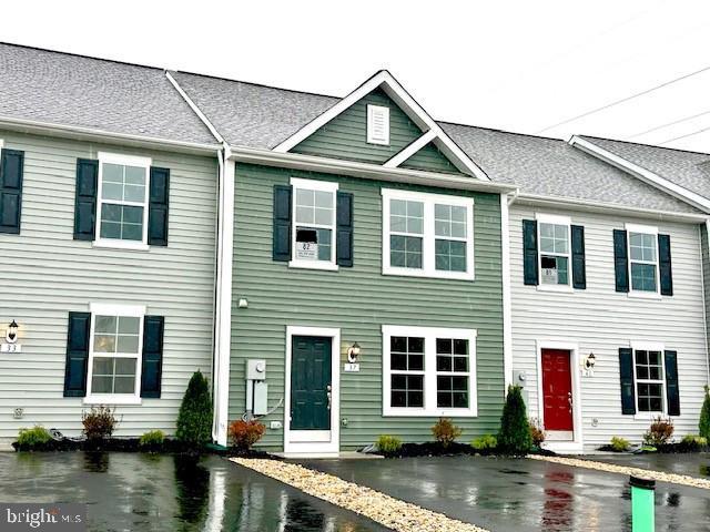 **OFFERING UP TO $10K IN CLOSING ASSISTANCE WITH THE USE OF PREFERRED LENDER AND TITLE FOR HOMES SETTLED ON OR BEFORE DECEMBER 31ST 2023! **
This Madison II Morning Room plan is uber popular, with uber open space off back of kitchen and primary bedroom! Yes, it is uber awesome! 2x6 exterior wall with more insulation and top brand Lennox for more efficient new home = lower utility bills for you! Positively life changing! Half this row sold before framing second floor! Best buy in the county! Quiet country living and still close to so much! Whispering Pines community features the special blend of small town charm and accessibility to everyday conveniences. Choose between the areas premier shopping and dining only 11 minutes away or go local at popular Orr's Farmers Market. Located along the gateway to the Shenandoah Valley Region minutes from I-81 this community also offers a short 20 minute commute to Winchester, VA. Within minutes to I-81, three miles from Inwood, ten miles to Locust Golf Course and seventeen miles to Loudoun County. Don't wait or this will be sold! Don't forget to ask about closing cost assistance. Registration Required. *Photos may not be of actual home. Photos may be of similar home/floorplan if home is under construction or if this is a base price listing. *