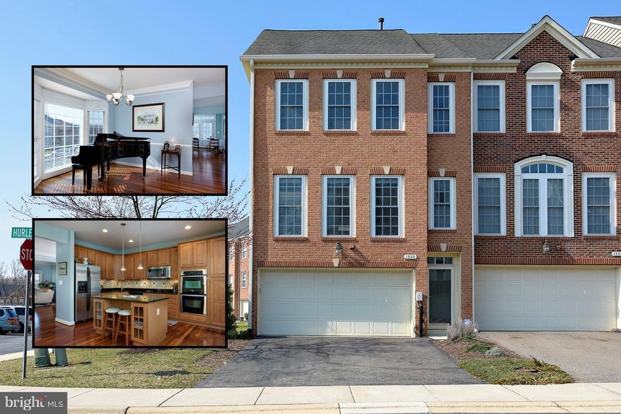 Stunning brick front townhome w/2 car garage and 8' bump outs on all 3 levels - filled with natural light! Meticulously maintained & stylishly decorated with upgrades galore! Open concept features gorgeous gourmet KIT, gleaming Brazilian Tigerwood floors on main level, NEW carpet, spacious master suite w/ walk-in closet & luxury master bath! Custom built composite deck is PERFECT for entertaining!