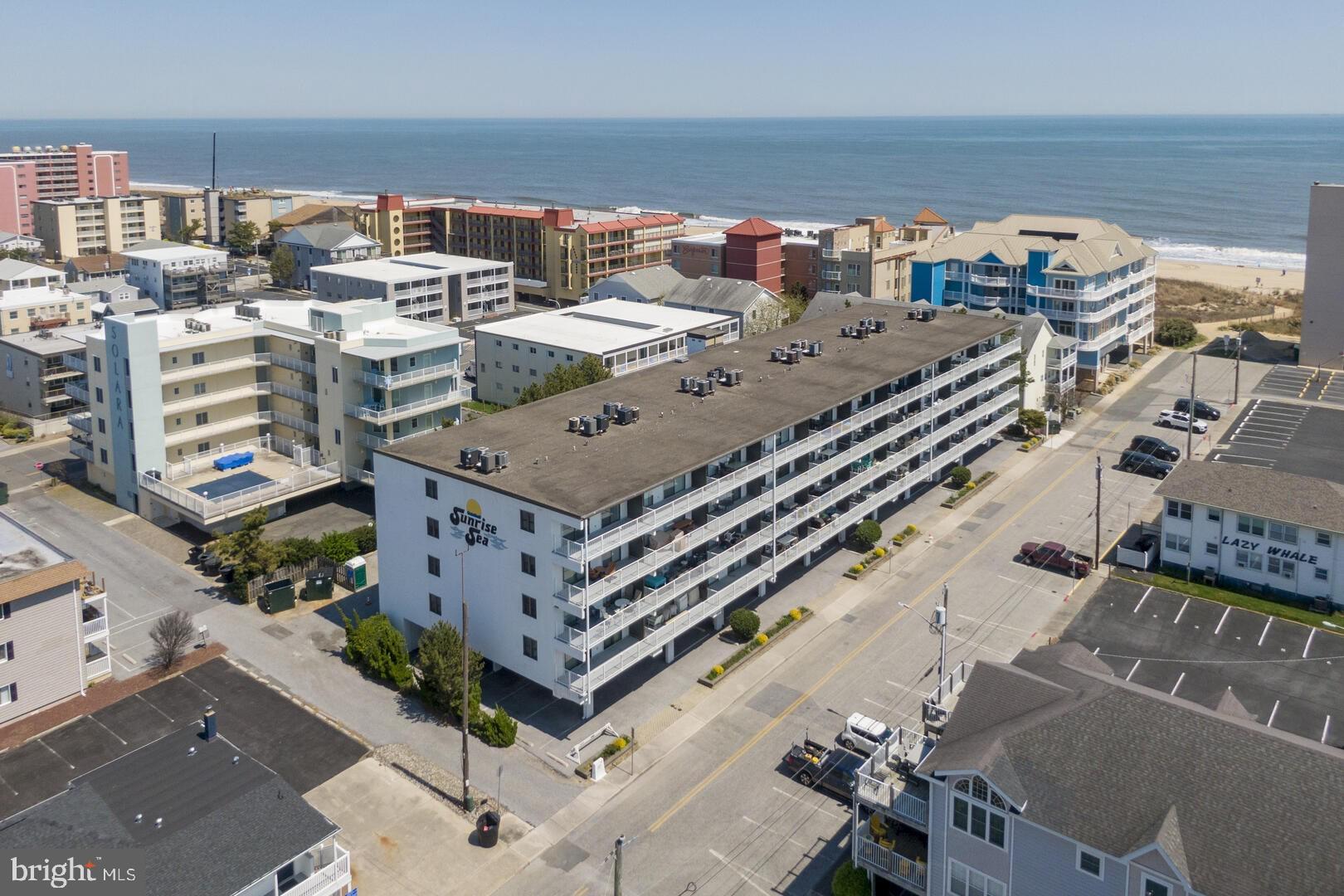 Back on the Market! Buyer did not perform so NOW is your chance! Move-in ready and Fully furnished! Experience the charm of Sun Rise Sea 208, where convenience and coastal charm come together in perfect harmony. Ideally nestled in mid-town Ocean City, this 2-bedroom, 2-bath condo spans 996 square feet and is situated on the 2nd floor, providing a coastal retreat with captivating views.
The spacious 25-foot southern-exposure balcony is perfect for soaking in stunning sunsets over the bay and breathtaking sunrises over the ocean. Just steps from the beach, you can have your toes in the sand within minutes.
This building offers an array of amenities, including the convenience of an outdoor pool, an elevator for easy access, a bike rack, and ample under-the-building parking to ensure your car stays cool on hot summer days while being protected from the elements. Whether you're seeking a private escape or a lucrative rental investment, this condo opens doors to endless possibilities.
Situated in the vibrant heart of mid-town, you'll enjoy unparalleled convenience with nearby shopping, a diverse array of eateries, and reliable public transportation.
Embrace this ultimate beachy vacation lifestyle—the sun and sand are waiting for you!