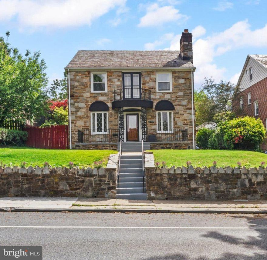 This exceptional stone colonial in the Mayfield community blends timeless architecture with the ease that today’s lifestyle demands. With over 3,000 finished square feet, four bedrooms, and three and a half baths, every corner of this home offers a way to live, work, or unwind with quiet nooks and open flow that invite creativity and comfort.

On the main level, the open floor plan offers space for effortless entertaining. Sunlight is cast through leaded and stained glass windows adding warmth further elevated by a striking carved fireplace and hardwood floors. The gourmet kitchen is thoughtfully designed with granite counters, stainless steel appliances,  a breakfast bar, soft close cabinetry, and pantry. A main level office or bonus room and convenient powder room add flexibility for work, play, or everyday living. 

Upstairs, the primary suite is a sanctuary, complete with a spacious walk-in closet, spa inspired ensuite bath with double vanity and modern walk in shower, and a charming Juliet balcony overlooking Herring Run Park. Two additional bedrooms and hall bath complete the second level and a finished attic level provides an elevated fourth bedroom or retreat. 

The lower level expands the living space with a knotty pine family room anchored by a wood burning fireplace, along with a full bathroom, dedicated laundry area, and flexible space perfect for a home gym, playroom, or media room. Outdoors, enjoy a spacious backyard, patio, and detached garage. 

Just minutes from Downtown Baltimore, Johns Hopkins, Clifton Park Golf Course, Lake Montebello, and Herring Run Park, the area delivers a rare balance of tranquility, character, and accessibility.