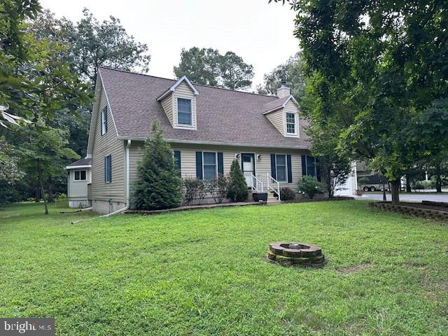 Charming 4 bedroom, 2 bath Cape Cod just a short distance to the Newly Open 2025 Caroline Country Club. Situated on over 1/2 acre with access off Pealiquor Rd or Woods Rd. Mature shade trees and extensive landscaping. A large deck leading to your own gazebo with hot tub, buyer to verify working condition. Updated kitchen with granite and Stainless Appliances. The roof was replaced in 2023 and new heat pump 2025. There is a whole home generator, so no need to worry about power outages.