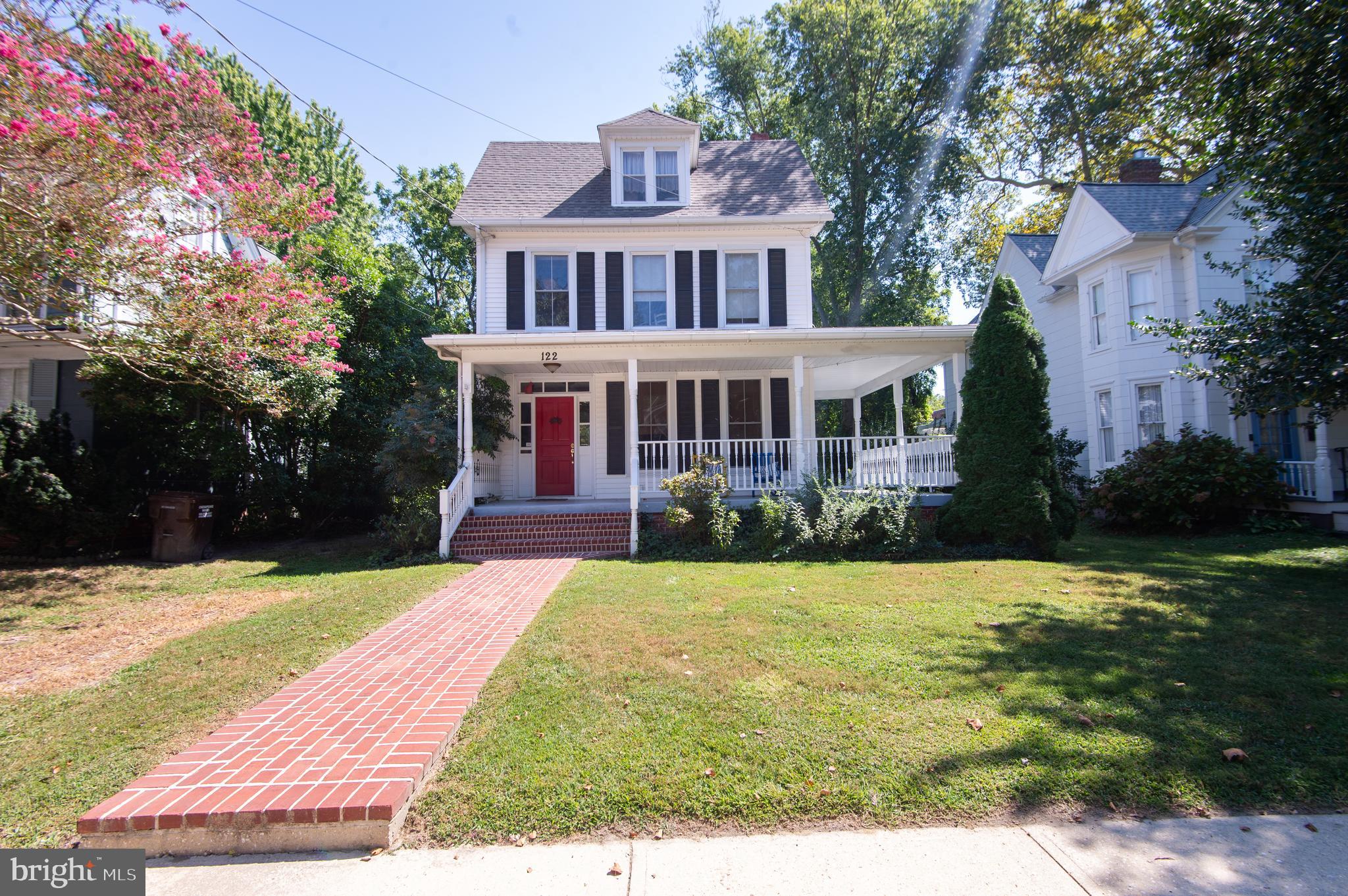 Victorian 1900’s home located in Historic District of Cambridge. Just a few doors away from the Choptank River, Long Wharf and Municipal Yacht Basin. Enjoy the convenience of being within walking distance to downtown galleries, restaurants, boutiques and dining. Come up the inviting brick walkway and brick steps to the charming wraparound porch perfect for entertaining or just relaxing in the breeze on a hot summer day. Welcome inside to the spacious living room with built-in bookcases, gas fireplace and wood floors. Separate dining room offers plenty of space for a large table for gatherings and a pantry for storage. Eat-in kitchen has wood and laminate countertops and overlooks the back deck and yard. Upstairs are three bedrooms and one full bathroom. Newer carpet covers the stairway and one of the bedrooms. Third level has room that could be used as an additional bedroom with adjacent huge attic area. Situated on a generous size lot, the back yard is great for a flower garden and the large deck is perfect for cook-outs. Also has a shed and fence across the back for privacy. Private off-street driveway.
Victorian charm and character adorns this home. Come take a look at this timeless beauty.