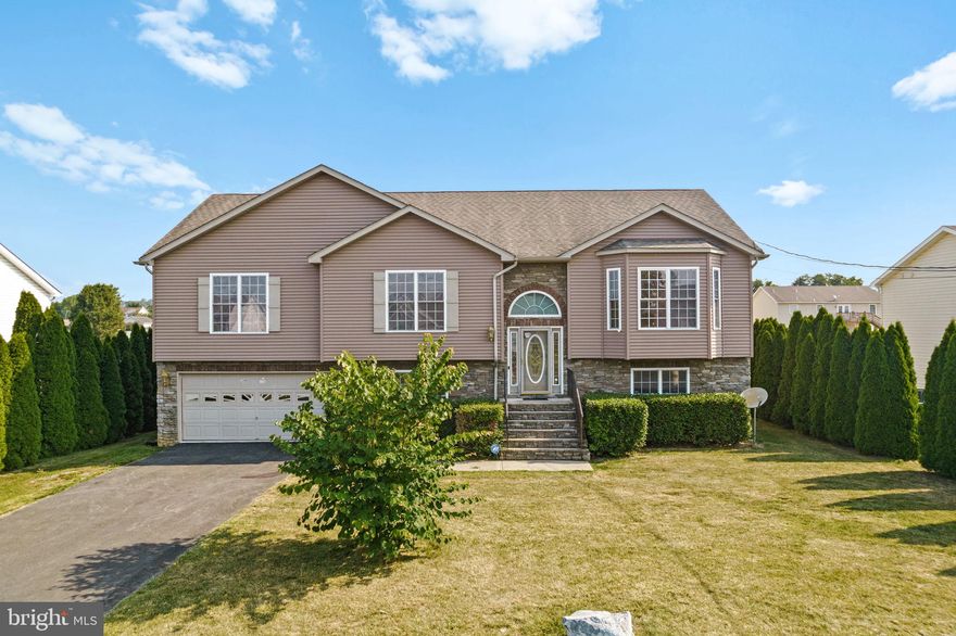 Here is the one you've been waiting for!  One of the largest and most nicely appointed homes in this quiet community. Great curb appeal and upscale feel throughout this home with 3,290 sq ft of living area.  Enormous main level living area with vaulted ceiling, gourmet island kitchen, built in wet bar, Primary bedroom with tray ceiling and ensuite full bath with soaking tub.  Situated on opposite side of living area from the secondary bedrooms affording nice privacy.  Secondary bedrooms are very spacious also upgraded with tray ceilings. The lower level provides an ideal family room area with fireplace, pool table area, and additional/possible 4th bedroom.  Another room could be used as an office or workout room.  Walk out to large back patio and huge fully fenced back yard.  Upper level has covered screened in porch, perfect for enjoying morning coffee.  The back yard has mature apple and pear trees which are currently producing. Professional Photos to follow.