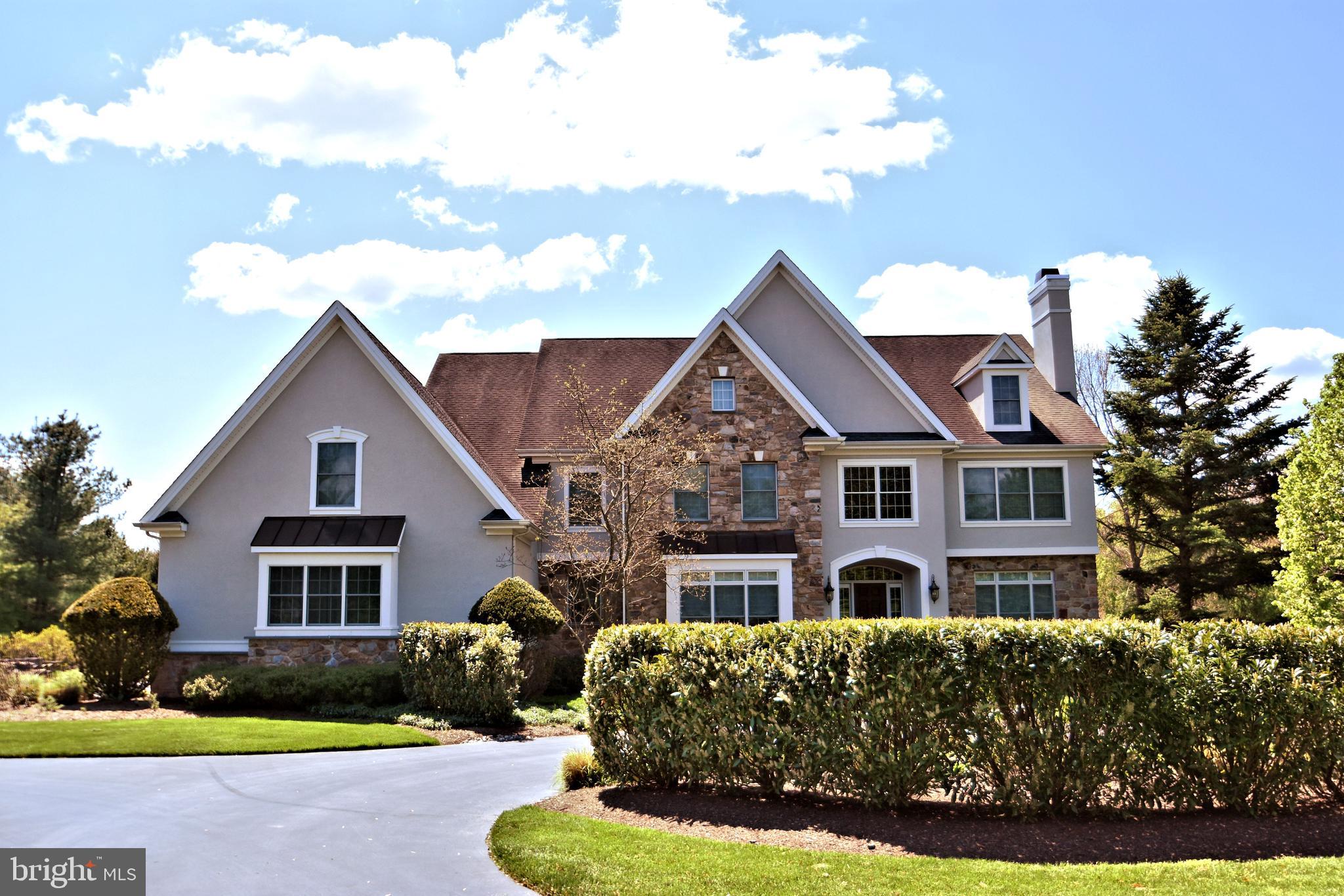 Situated perfectly on a splendid 2.6 acre parcel sits this spectacular custom built luxury home. Located in one of Upper Makefield s most sought after communities, Longmeadow, this 5 Bedroom property offers the discriminating buyer a wide array of features and amenities, and over 7,000 square feet of finished space. Gleaming oak hardwood floors, impressive crown molding, decorative columns and a soaring two story foyer greet you upon entering. To the right, the open formal living room features in-laid carpet and a beautiful fireplace. To the left, your formal dining room, also with in-laid carpet, is very generously sized for large family gatherings. The two-story family room features a fabulous floor to ceiling stone fireplace, built in entertainment center, walls of windows, and is open to the kitchen. The gourmet kitchen with large breakfast table area is a chef s delight, featuring Sub Zero and Thermador stainless steel appliances, granite counters, custom tile backsplash, two -tiered center island with built in wine coolers and vegetable sink, double oven, walk-in pantry, generous cabinet space and more. A bright sunroom is off the kitchen and features triple French door access to the deck and rear yard. An office/library, nicely sized laundry/mud room, two powder rooms, and convenient rear staircase complete the first floor. The upper level features a large overlook to the foyer and family room, with built-ins and sitting area to cuddle up with your favorite book. The luxurious Master Suite features a coffered ceiling, fireplace, sitting room with outside balcony, his and hers walk-in closets. The opulent Master Bath features marble flooring, oversized shower with multiple sprays, his and hers vanities, second make-up vanity, large jetted tub and volume ceiling. And the large bonus room retreat can be the perfect second office, gym or additional massive closet. The Princess Suite, Bedrooms 3 and 4, which share a large Jack and Jill bath, are all bright and airy and complete the upper level. The fully finished lower level features amazing areas for entertainment, exercise, arts and crafts and much more, including Bedroom 5, featuring a private bath and large closet space. Kitchenette, second full bath, ample storage space, and walk-out French doors to trellis covered patio complete the lower level. The property features a wide array of gorgeous mature evergreen and deciduous trees, immaculate lawn and landscaping, post and rail perimeter fencing, full sized tennis/sport court/basketball court with nighttime lights, multi-zone irrigation, governor s driveway entrance. A three-car garage, with one bay featuring a car lift, security system, three zone HVAC, whole house back-up generator and more await you. Conveniently located in the heart of the Council Rock School District, just minutes from I-95, New Jersey Bridges, New Hope and Newtown. The home and property have been lovingly maintained, and are offered for the first time by its original owners.