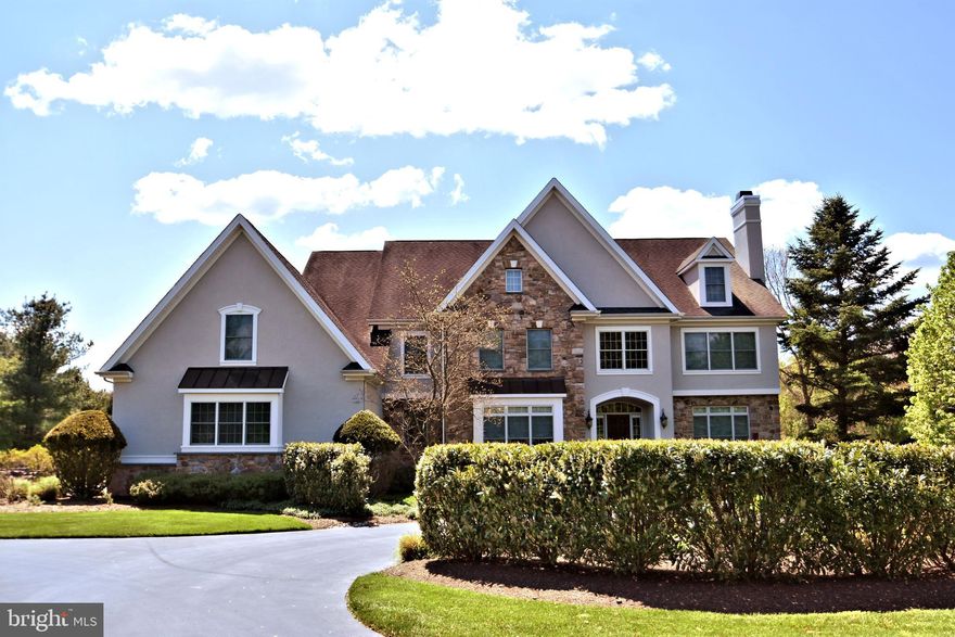 Situated perfectly on a splendid 2.6 acre parcel sits this spectacular custom built luxury home. Located in one of Upper Makefield s most sought after communities, Longmeadow, this 5 Bedroom property offers the discriminating buyer a wide array of features and amenities, and over 7,000 square feet of finished space. Gleaming oak hardwood floors, impressive crown molding, decorative columns and a soaring two story foyer greet you upon entering. To the right, the open formal living room features in-laid carpet and a beautiful fireplace. To the left, your formal dining room, also with in-laid carpet, is very generously sized for large family gatherings. The two-story family room features a fabulous floor to ceiling stone fireplace, built in entertainment center, walls of windows, and is open to the kitchen. The gourmet kitchen with large breakfast table area is a chef s delight, featuring Sub Zero and Thermador stainless steel appliances, granite counters, custom tile backsplash, two -tiered center island with built in wine coolers and vegetable sink, double oven, walk-in pantry, generous cabinet space and more. A bright sunroom is off the kitchen and features triple French door access to the deck and rear yard. An office/library, nicely sized laundry/mud room, two powder rooms, and convenient rear staircase complete the first floor. The upper level features a large overlook to the foyer and family room, with built-ins and sitting area to cuddle up with your favorite book. The luxurious Master Suite features a coffered ceiling, fireplace, sitting room with outside balcony, his and hers walk-in closets. The opulent Master Bath features marble flooring, oversized shower with multiple sprays, his and hers vanities, second make-up vanity, large jetted tub and volume ceiling. And the large bonus room retreat can be the perfect second office, gym or additional massive closet. The Princess Suite, Bedrooms 3 and 4, which share a large Jack and Jill bath, are all bright and airy and complete the upper level. The fully finished lower level features amazing areas for entertainment, exercise, arts and crafts and much more, including Bedroom 5, featuring a private bath and large closet space.  Kitchenette, second full bath, ample storage space, and walk-out French doors to trellis covered patio complete the lower level. The property features a wide array of gorgeous mature evergreen and deciduous trees, immaculate lawn and landscaping, post and rail perimeter fencing, full sized tennis/sport court/basketball court with nighttime lights, multi-zone irrigation, governor s driveway entrance. A three-car garage, with one bay featuring a car lift, security system, three zone HVAC, whole house back-up generator and more await you. Conveniently located in the heart of the Council Rock School District, just minutes from I-95, New Jersey Bridges, New Hope and Newtown. The home and property have been lovingly maintained, and are offered for the first time by its original owners.