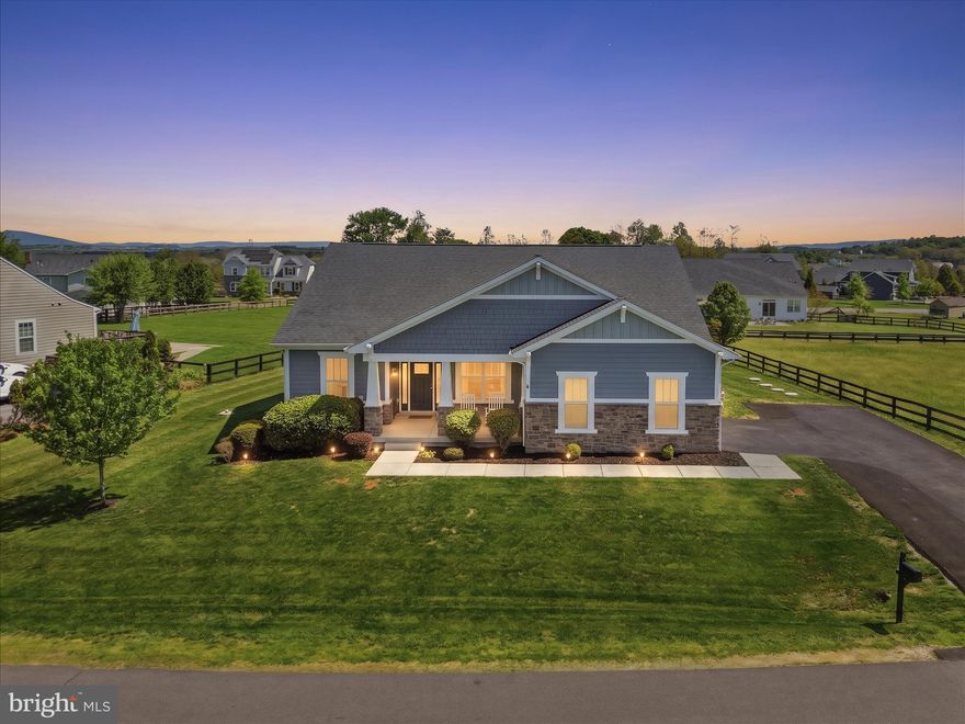 Set on a scenic lot with mountain views, this main-level living home in Dutchmans Creek offers the perfect balance of space, functionality, and location, just about a mile from downtown Lovettsville. With a well-designed layout and flexible living spaces, this home is ideal for both everyday living and entertaining.

The main level features an open-concept layout with the family room flowing into the kitchen and dining area. A dedicated main-level office with French doors provides a private and functional work-from-home space. The kitchen includes a large granite island, ample cabinetry, pull-out shelving, a walk-in pantry, and a butler’s pantry for additional prep and storage. Additional features include 2” blinds, updated ceiling fans, a Ring doorbell system, and a brand new washer and dryer (2026).

The main level includes three bedrooms and two full bathrooms, offering true one-level living. The walk-up lower level expands the home’s functionality with a fourth bedroom, full bath, large recreation area, bonus room, and generous storage space.

Outdoor living is just as appealing, with a rear deck overlooking the backyard and mountain views. The widened and extended driveway adds convenience, along with the home’s inviting curb appeal featuring a front porch and stone accents.

Located near Lovettsville, Purcellville, and Brunswick, with easy access to local shops, dining, wineries, breweries, the Potomac River, and the Appalachian Trail.

Open House, Saturday, May 16th 12pm-2pm.