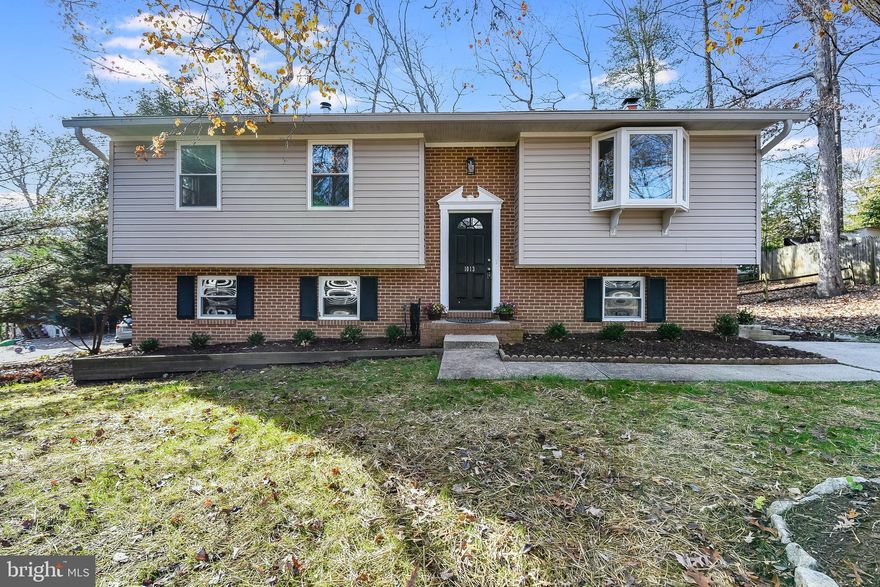 Welcome to Arden on the Severn! Just steps from the water (approx. 700 feet), this spacious 4-bedroom, 2.5-bath split foyer home offers the best of this sought-after waterfront community. Located in Section 4, enjoy exclusive access to private beaches, boat ramps, and more. The open main level features a bright living room, dining area, and updated kitchen with island — plus a sliding glass door to a large deck overlooking the fully fenced backyard. Upstairs offers three bedrooms and 1.5 baths, including a half bath in the primary bedroom. The walk-out lower level includes a second living area, full bath, fourth bedroom, and a bonus room perfect for storage, workshop, or fitness space — with access to the backyard. Masonry firepit, and pool table can convey! Now districted to the brand-new Severn Run High School. Enjoy the beach lifestyle just minutes from major routes, Fort Meade, Annapolis, and Baltimore/DC.