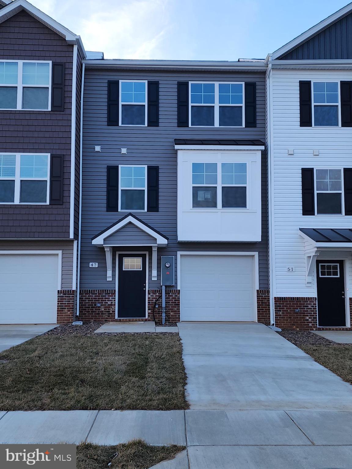 Brand new garage townhome for lease and YOUR FIRST YEAR POWER BILL IS FREE!!! This interior-unit 4 bedroom, 3.5 bath garage townhome has an open concept design on the main floor w/ a kitchen island with granite top, 42" Maple Slate colored cabinets, a high low peninsula with granite top for entertaining, stainless-steel appliances, a large living room w/ a bump out and a half bath. The upper level features a large primary bedroom w/ cathedral ceiling, walk-in closet, double vanity and a walk-in tile shower; two guest bedrooms , full guest bathroom, linen closet and laundry. The lower levels feature a coat closet, foyer, single car garage w/ automatic garage door opener (app enabled also) and fourth bedroom with a full bath & linen closet and a door to access to your large backyard, this room makes a great recreation room as well. There are NO homes built behind you here, pasture view!!! Throughout the home you will find recessed LED's, ceiling fans in the Primary bedroom & living room w/ each additional bedroom pre-wired for ceiling fans. High/Low outlets w/ pass through plates w/ CAT5/COAX/HDMI in Owner's bedroom & living room to make mounting your TV a breeze.