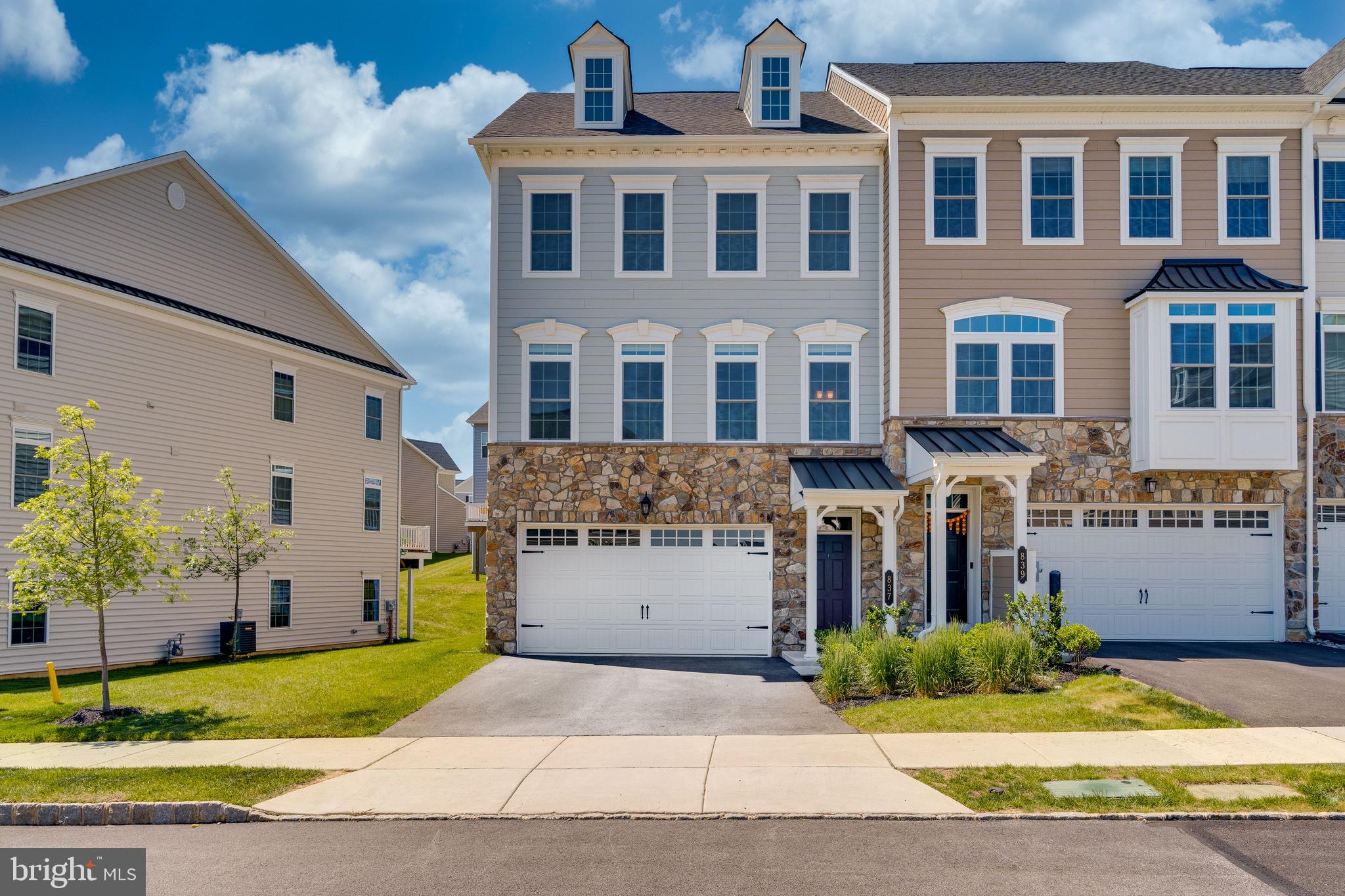 Welcome to 837 Stonecliffe Road, located in the desirable Atwater community in Malvern, Great Valley School District. This stunning, end-of-row townhome offers 3 bedrooms, 3.5 bathrooms, and a fully finished, walk-out basement. Prepare to be impressed as you enter the main floor. The beautiful dining room features crown molding, chair rail, and engineered wood floors that flow seamlessly throughout the main floor. The open concept kitchen and living room are ideal for entertaining. The kitchen boasts an oversized enter island with seating for up to 6 people, white shaker cabinets, granite countertops, gas cooking, stainless steel appliances, upgraded hood/vent, and a pantry. The living room has a 10’ bump-out making the room incredibly spacious. There are two sets of sliding doors that provide access to the deck that runs along the entire back of the home, and an abundance of natural light. A powder room completes the first floor. Upstairs is the spacious primary bedroom with high ceilings, neutral carpet, 2 walk-in closets, and a primary en-suite with double vanity and stall shower. There are two additional bedrooms, that share a full hall bathroom with double vanity and tub/shower combo. The washer and dryer are conveniently located here as well. The finished, walk-out lower level is bright and cheerful with lots of windows and glass doors leading to the backyard. The options for this space are endless and could be used as a play area, gym, in-home office, and more. A bathroom is located on this level as well. Nest smart thermostat. 2-car attached garage. Enjoy low maintenance living - all snow is removed up to the front door and all lawn care is taken care of by the HOA. Close to Vanguard, Paoli Hospital, PA Turnpike, 202, shopping, dining, King of Prussia and more.