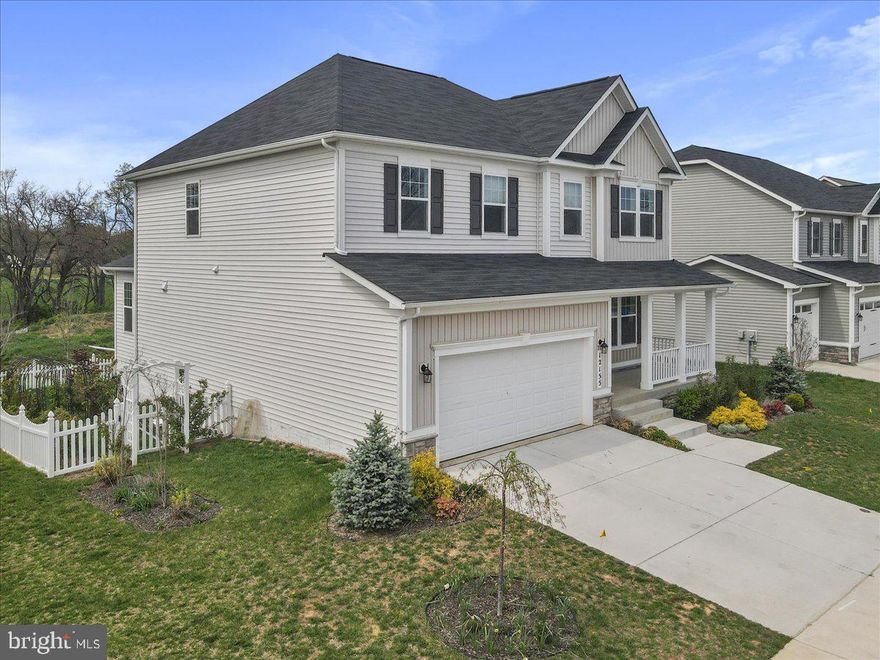 Built in 2022, this spacious 5-bedroom, 3.5-bath home offers nearly 3,850 total square feet of modern living in a highly desirable location close to shopping, dining, and major commuter routes in Hagerstown. The open floor plan features a beautifully designed kitchen with a large center island, gas cooking, double oven, and abundant cabinet space, flowing directly into the main living area with a cozy fireplace.

The home offers zoned HVAC systems for added comfort and efficiency, generously sized bedrooms, and a finished layout designed for both everyday living and entertaining. The primary suite provides excellent space and functionality, while the additional bedrooms and baths offer flexibility for guests, office space, or multi-generational living.

Outdoor features include a deck overlooking the fenced rear yard, perfect for relaxing or entertaining. Additional highlights include washer and dryer, a 2-car garage, and a Tesla charger already installed.

Residents also enjoy access to outstanding community amenities including a community center, adult and kiddie pools, exercise room, tennis courts, basketball courts, tot lots, and soccer field.

Move-in ready and loaded with upgrades, this home offers the space, features, and location today’s buyers are looking for. HOA fee is $67 monthly and pool table conveys!