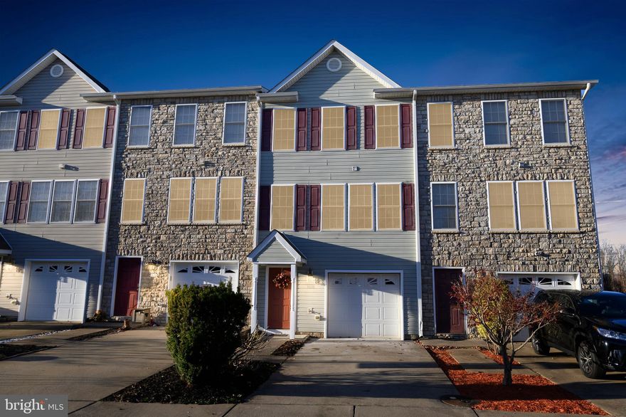 Welcome to sought after Locust Grove, VA! This beautiful tri-level townhouse is move-in ready, featuring fresh paint and new carpet throughout. Offers a spacious entry level primary bedroom as well as a second primary bedroom on the 3rd floor for added flexibility. The main level of the home features generous dining room area, large kitchen, and grand family room with access to the back deck. Plenty of space in the oversized garage too! Within walking distance to Walmart and a perfect location for commuting to Culpeper, Orange, Fredericksburg, or I95, this one needs to be on your list!