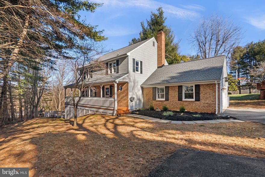 Beautifully maintained single-family residence offering 3 bedrooms, 2.5 bathrooms, and 1,914 finished square feet, privately tucked away on a serene, tree-surrounded 2.35-acre lot in sought-after Goshen Hunt Hills. A long private driveway leads to an expansive parking area and a two-car attached garage, while charming stepping stones guide you to the welcoming wraparound front porch and main entrance. 

Inside, a gracious foyer showcases classic wainscoting detail and sets the tone for the home’s timeless appeal. Newly refinished hardwood floors flow throughout the traditional main level, encompassing a sun-filled living room, an elegant formal dining room with lower wainscoting, and a comfortable family room anchored by a striking stone wood-burning fireplace. The family room also offers convenient access to the garage and exterior, along with a nearby powder room. The beautifully remodeled eat-in kitchen is both stylish and functional, featuring white cabinetry, abundant counter space, recessed lighting, stainless steel appliances, including a recently replaced refrigerator, and a seamless connection to the family room, ideal for everyday living and entertaining. The upper level hosts three bedrooms finished with luxury vinyl tile flooring, including a spacious primary suite with a walk-in closet and a tastefully renovated en-suite bathroom with a dual-sink vanity. A second full bathroom completes this level. The walk-out lower level presents a versatile blank canvas ready for customization and includes laundry facilities and exterior access.

Outdoor living truly shines with a charming wraparound porch that connects to an elevated rear deck overlooking a spacious, fully fenced, tree-lined backyard—perfect for relaxing, entertaining, or enjoying the peaceful natural setting. Additional highlights include a whole-house generator. Ideally located just minutes from local parks, hiking trails, shopping, dining, and major commuter routes, including I-270, Goshen Hunt Hills offers both tranquility and convenience.