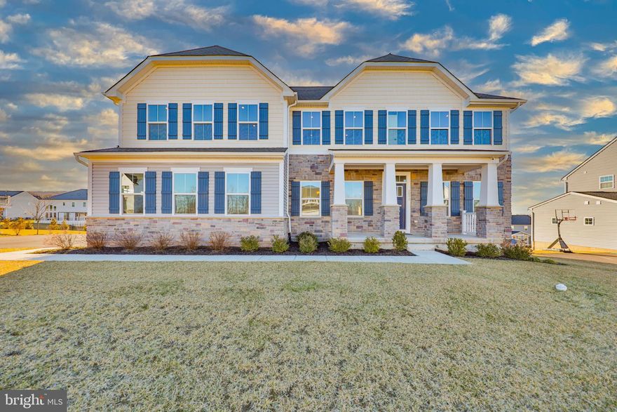 This beautifully designed Versailles model in the Estates at Saucon Valley community offers nearly 6,000 square feet of finished living space, blending elegant entertaining areas with a comfortable everyday layout. At the heart of the home, a dramatic two-story family room with a floor-to-ceiling stone fireplace creates a striking yet inviting gathering space, while large windows fill the home with natural light. The impressive kitchen features an oversized center island, abundant cabinetry, and opens seamlessly to the surrounding living and dining areas. With six bedrooms and six full bathrooms, the layout offers exceptional flexibility, including a first-floor bedroom with full bath that works well for guests, extended family, or a private office. Upstairs, the spacious primary suite offers a peaceful retreat with a sitting area, two walk-in closets, and a luxurious bathroom with dual vanities and a spa-style shower. The finished walk-out lower level expands the living space with a recreation area, media room, office, and full bath. Enjoy panoramic valley views, access to the community walking trail, and the convenience of a three-car garage with EV charging, all within the Southern Lehigh School District.
