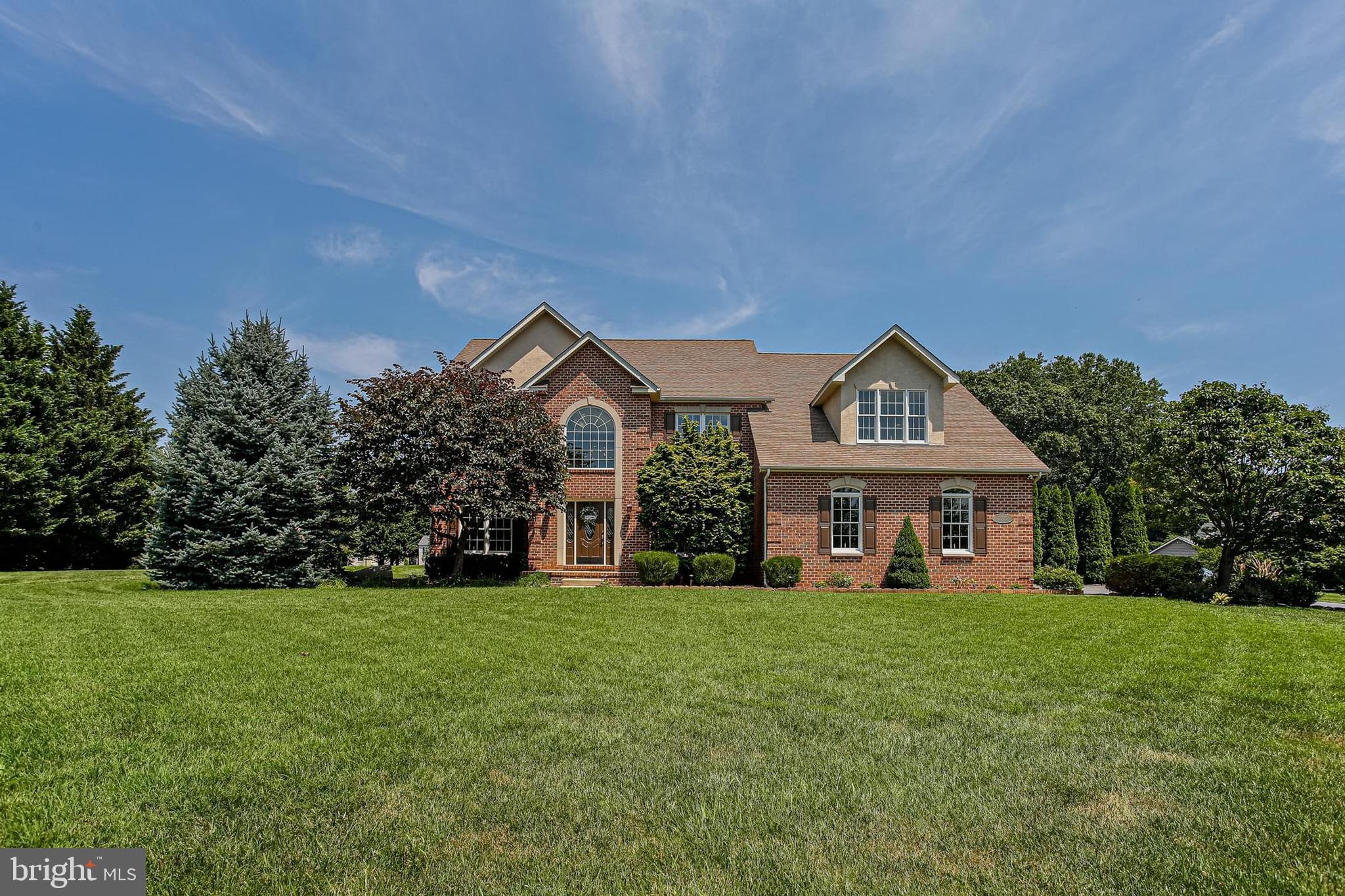 There is still time to move in prior to the first day of school! This large Fallston colonial has been meticulously maintained and updated by the original owners. Enter the home through the stunning two-story foyer and you are greeted with wood floors throughout the majority of the main level. The expansive main level features a living room, dining room, study, spacious kitchen with adjacent sunroom, updated mud/laundry room, and a large two-story great room. The updated kitchen includes a large center island, stainless steel appliances, cooktop, under cabinet lighting, backsplash, granite counters and ample premium cabinetry. The bright and cheery sunroom offers a great space for a relaxing morning cup of coffee. The two-story great room complete with a large brick fireplace is the centerpiece of the main level and the separate dining room, living room and study allow for even more spaces to entertain. The upper level features four spacious bedrooms, three full baths, new carpet and fresh paint. The primary bedroom has plenty of space for a sitting area, three large closets plus an additional linen closet and a luxurious primary bath with jetted tub, separate shower, and dual sinks. Water heater replaced in 2022, both AC units were replaced in 2020 with heat pumps added at this time, upper furnace replaced in 2025, and a new well pressure tank in 2022. The exterior features a level lot with a beautiful patio great for entertaining, a large shed for extra storage space, a Roof Maxx treatment in 2024, and fresh landscaping. Too much to list here, shows well.