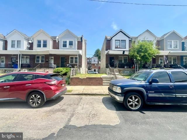 6731 WOOLSTON AVENUE